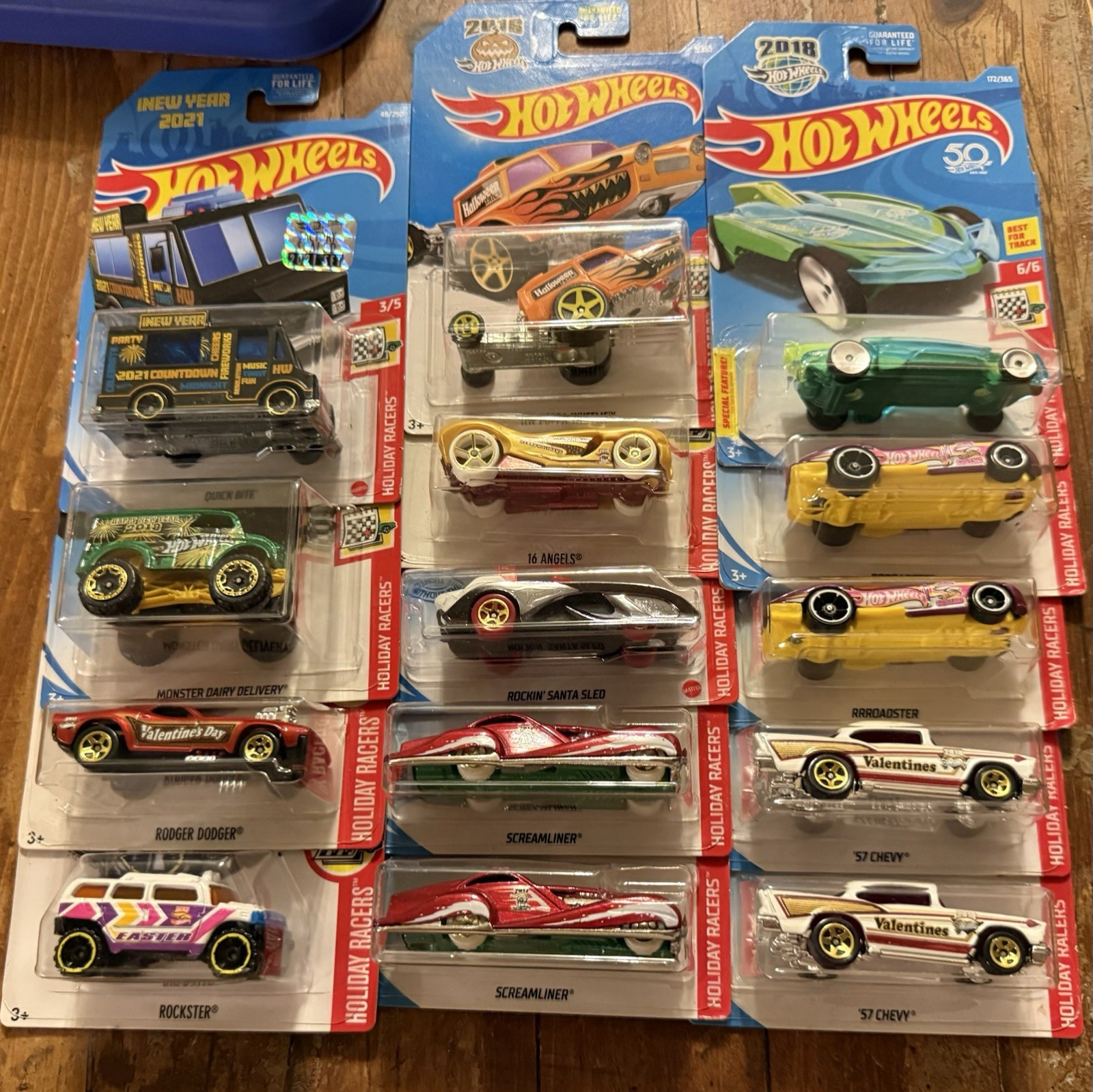 GROUP/LOT OF HOT WHEELS HOLIDAY RACERS! VARIOUS YEARS! 14 TOTAL DIE-CAST CARS!