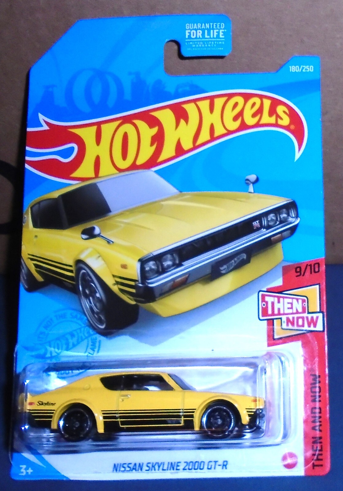 Nissan Skyline 2000 GT-R Hot Wheels -Then and Now 9/10 -Yellow