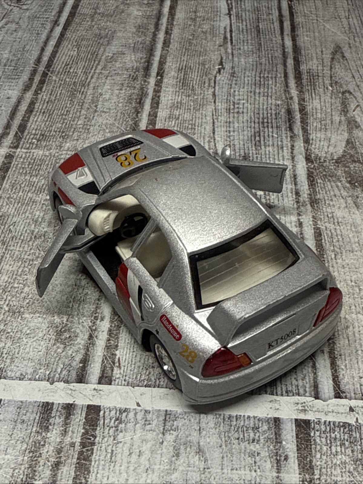 Kintoy Racing Silver Mitsubishi Evolution IV Toy Car Pull Back Die Cast 1:41