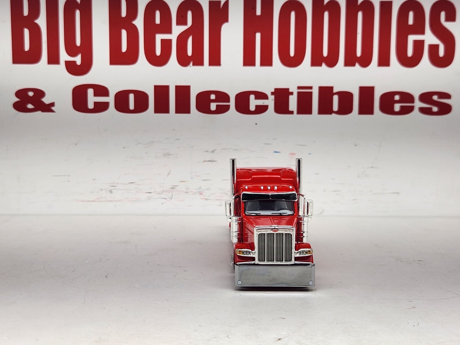 1/64 New DCP Red 589 Peterbilt 70″ Midroof Sleeper Blackjack