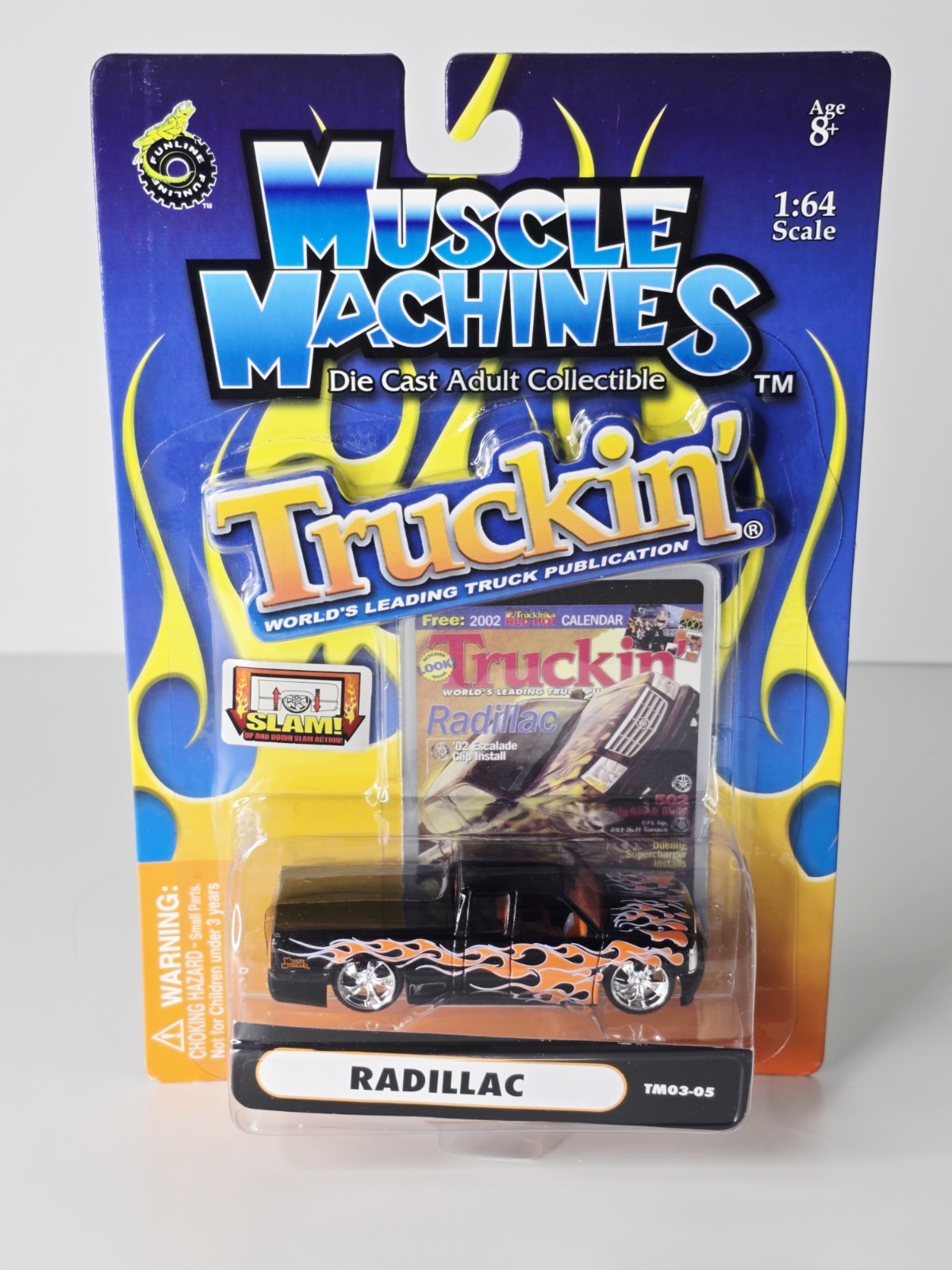 Muscle Machines Truckin’ – Radillac Black w/ Flames – 1:64