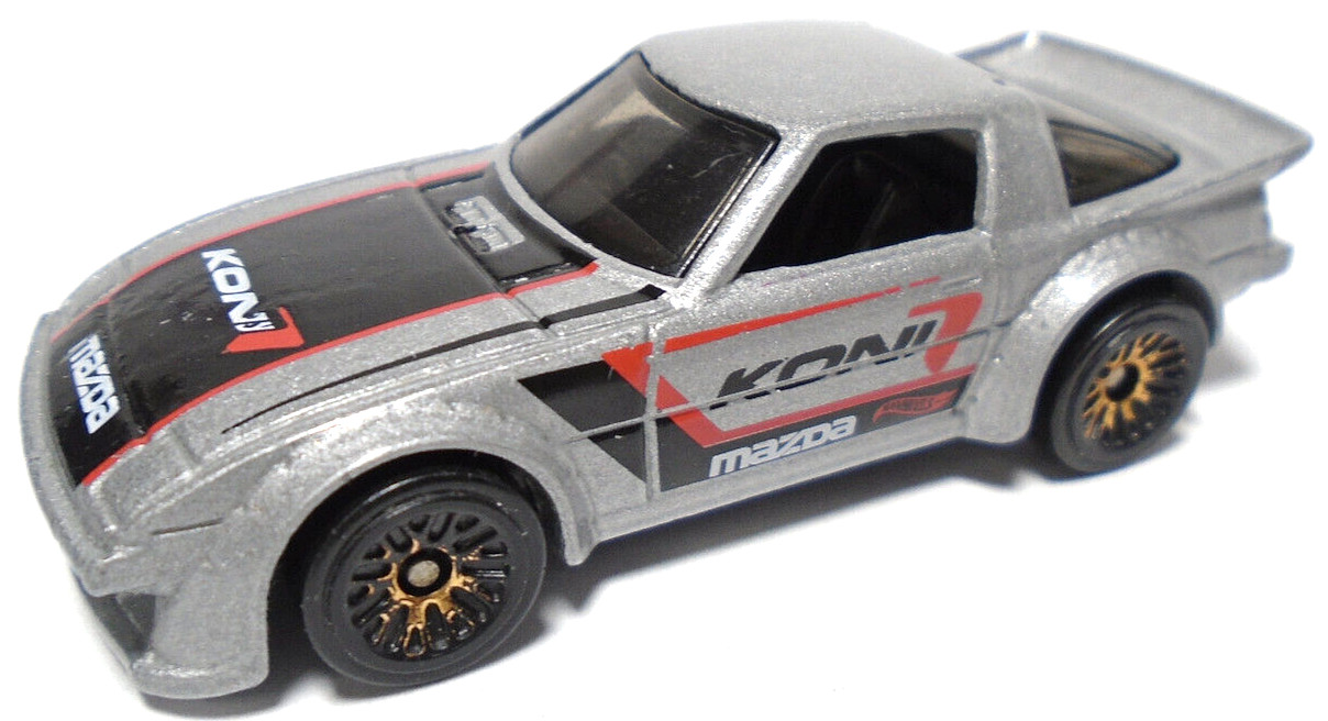 2011 HOT WHEELS MAZDA RX-7 KONI SILVER 2 5/8″ DIECAST RACE CAR WITH BLACK & RED