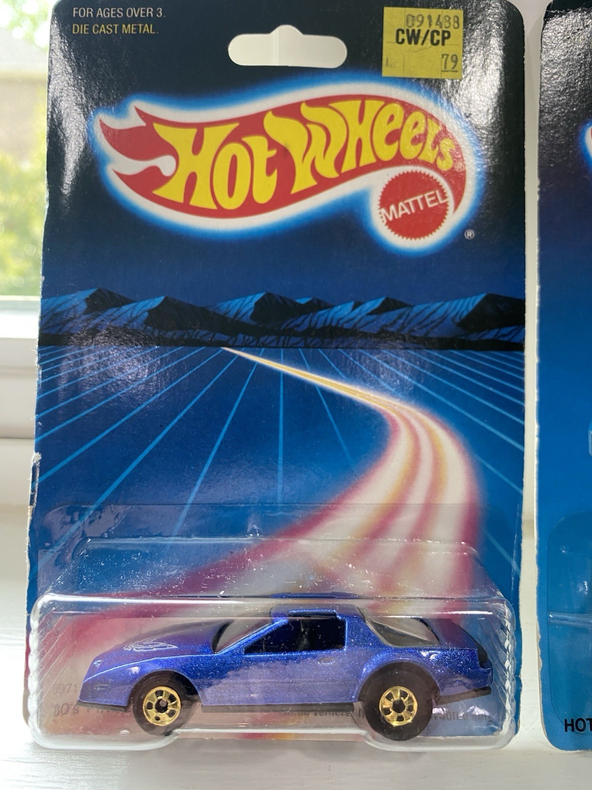 Hot Wheels ’80’s Firebird, Blue and Hot Bird, Black — 2 car set w/gold wheels