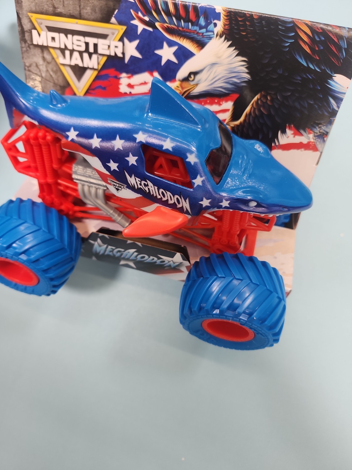 NEW RELEASE Monster Jam Megalodon Monster Truck 1:24 Stars & Stripes
