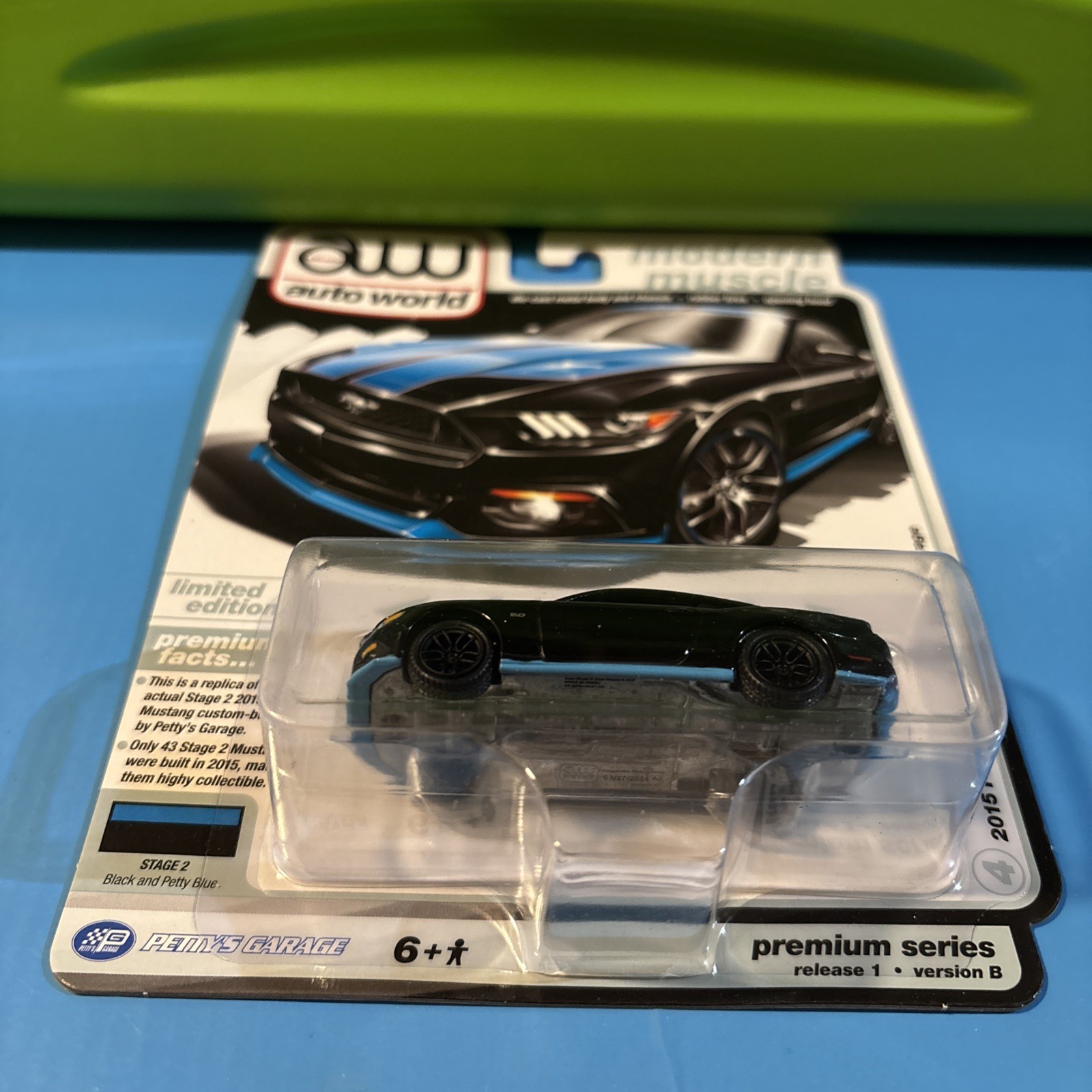 Auto World 2015 Ford Mustang GT Petty Garage *Black and Petty Blue*