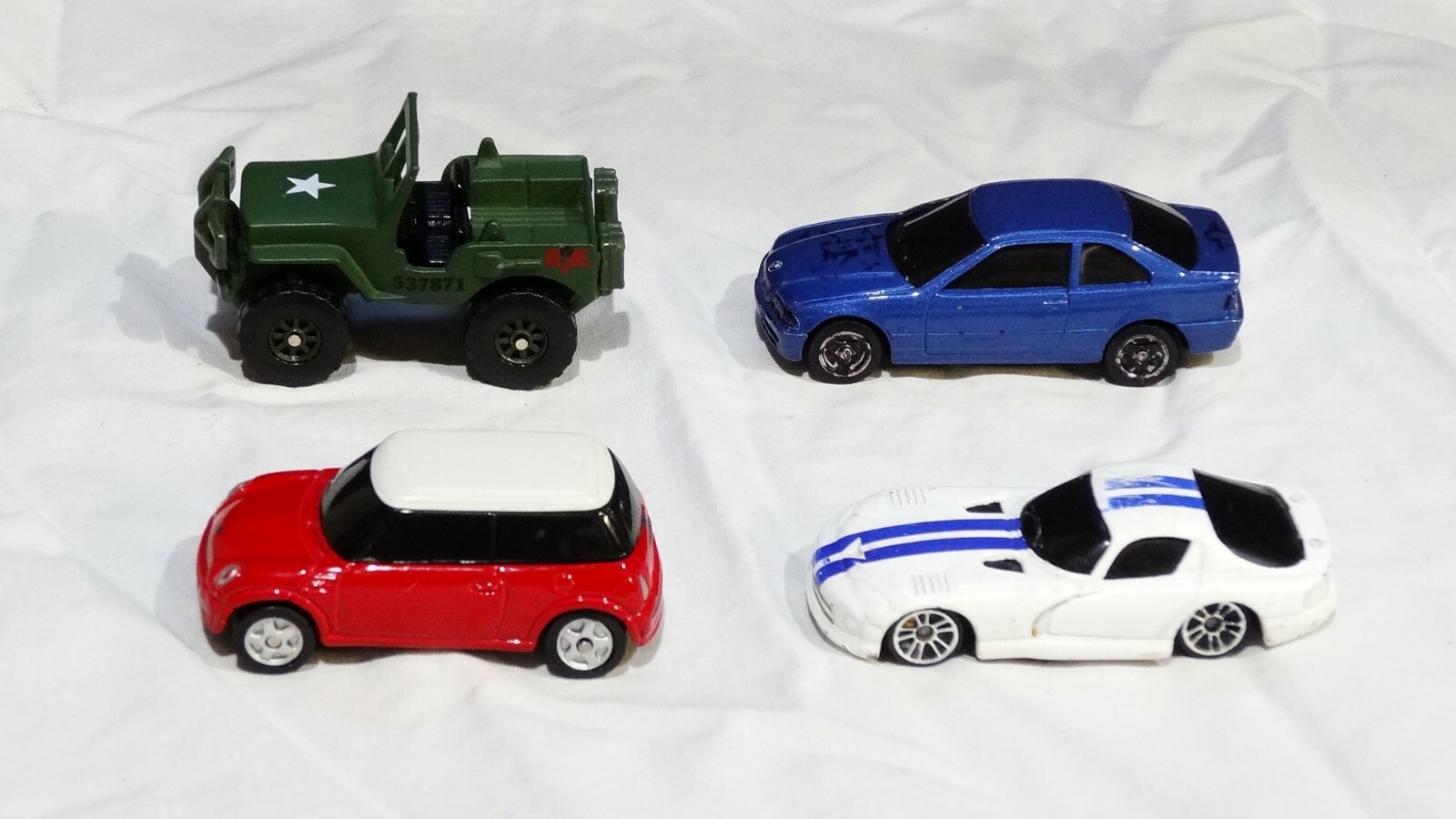 4 Diecast Maisto lot. In fair condition, Please see photos 