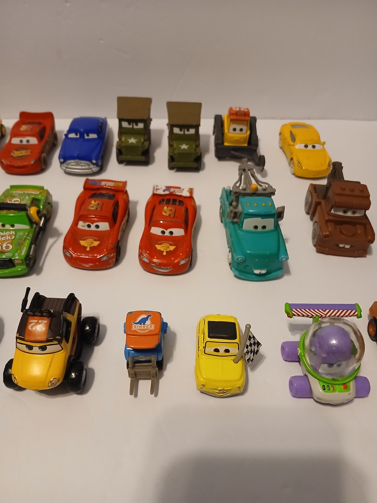 Disney Pixar Cars Lot Bundle of 26 Cars Die Cast And Plastic Lightning Mcqueen