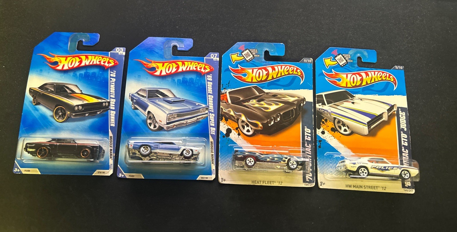 Hot Wheels 2 Muscle Mania, 1 Heat Fleet, 1 HW Main Street New Sealed lot Of 4￼