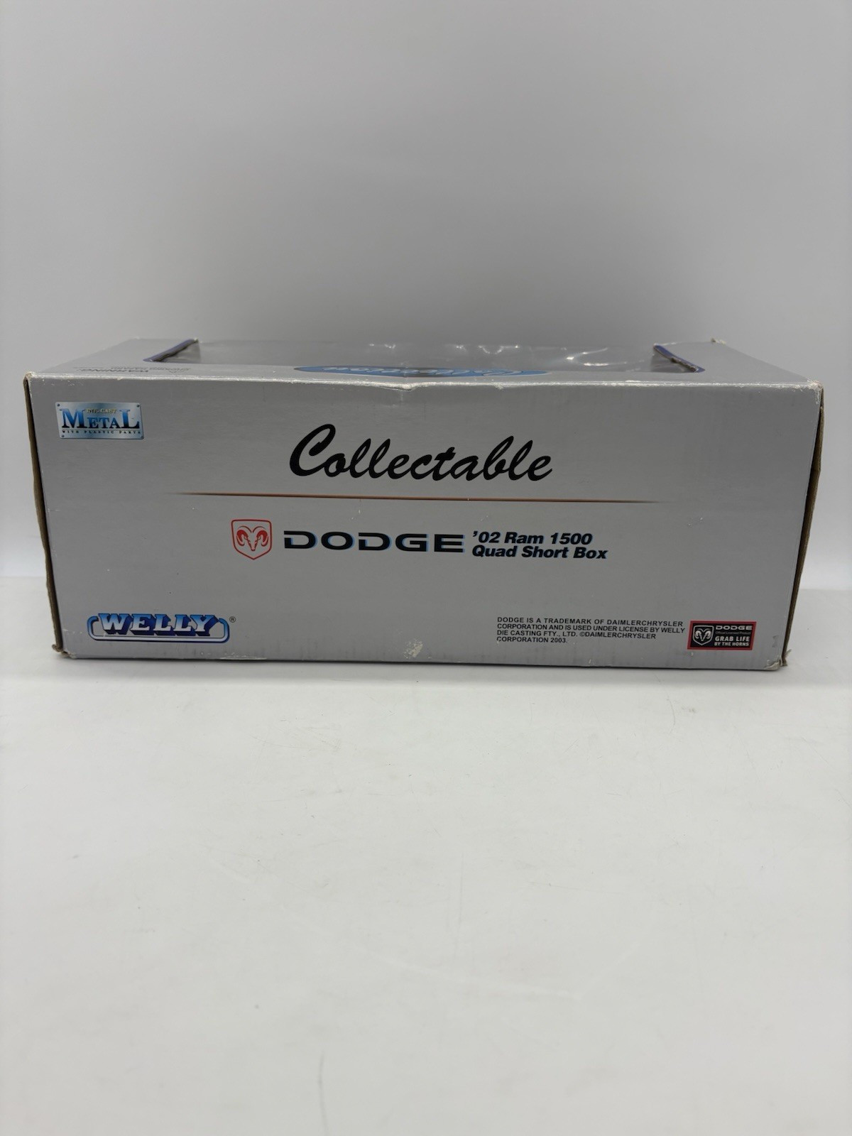Welly 2002 Dodge Ram 1500 Quad Short Box Diecast Pickup Truck 1:19 W Box – Blue