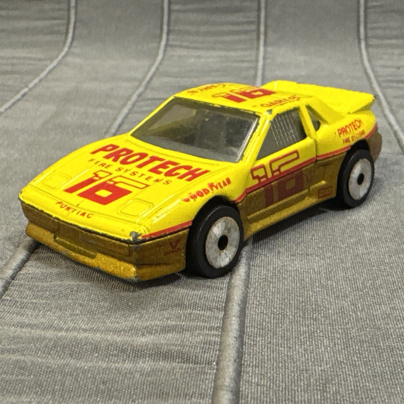Matchbox Pontiac Fiero, Yellow, #16 Protech Fire Systems
