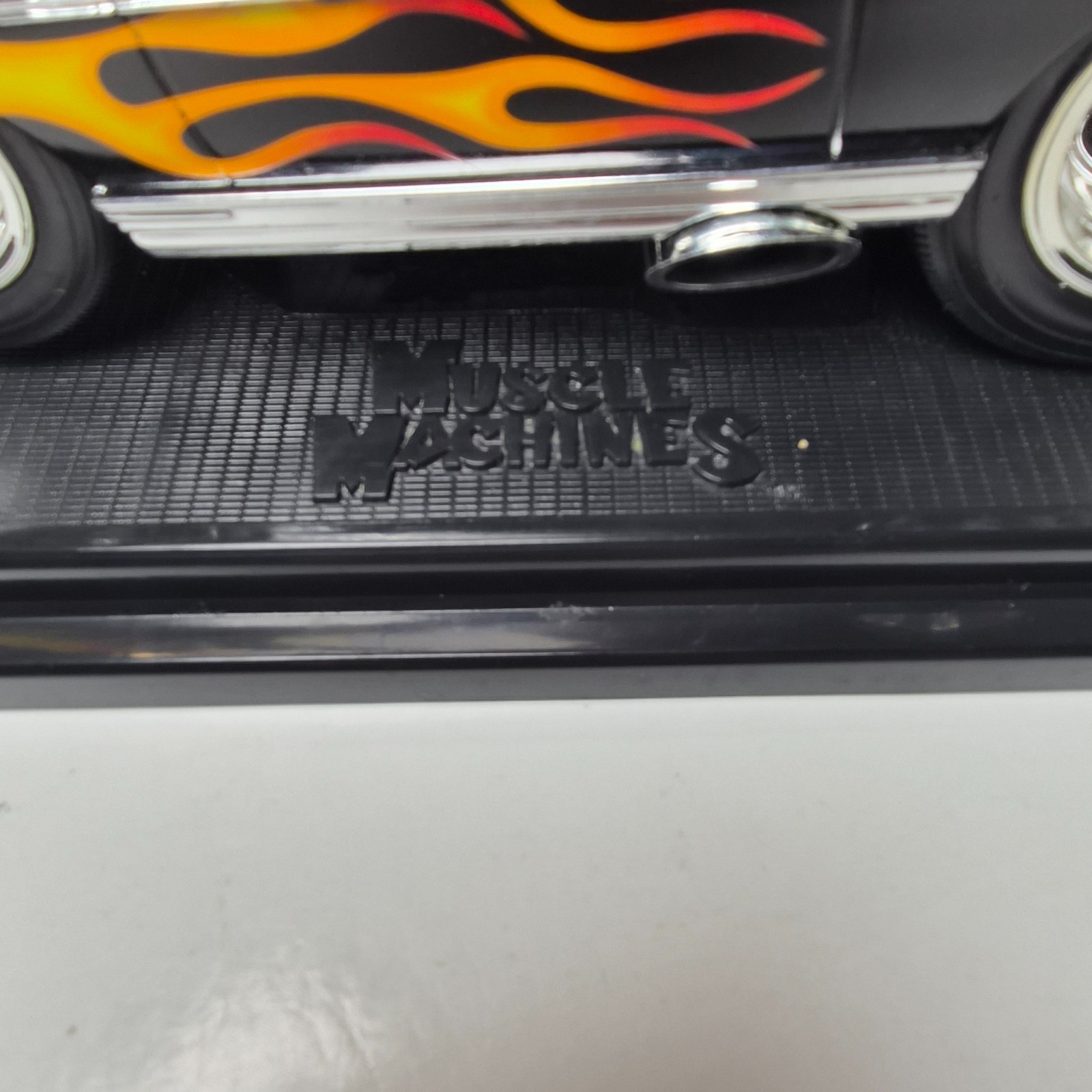 Muscle Machines 1967 Chevy Nova Black Flames 1:18 Diecast w/ Base