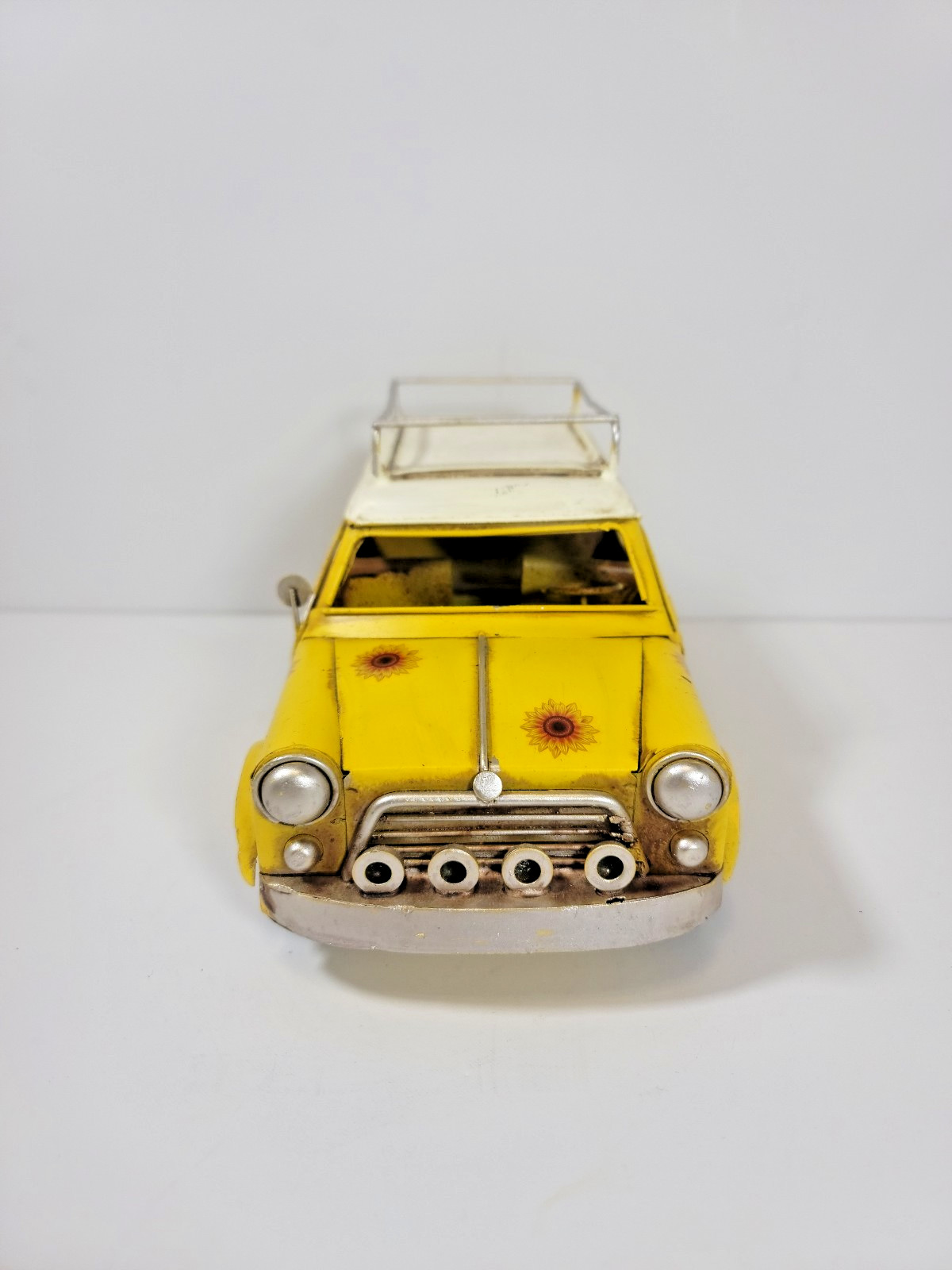 The Spring Shop Yellow Metal Mini Car with Sunflowers – Distressed Vintage Decor