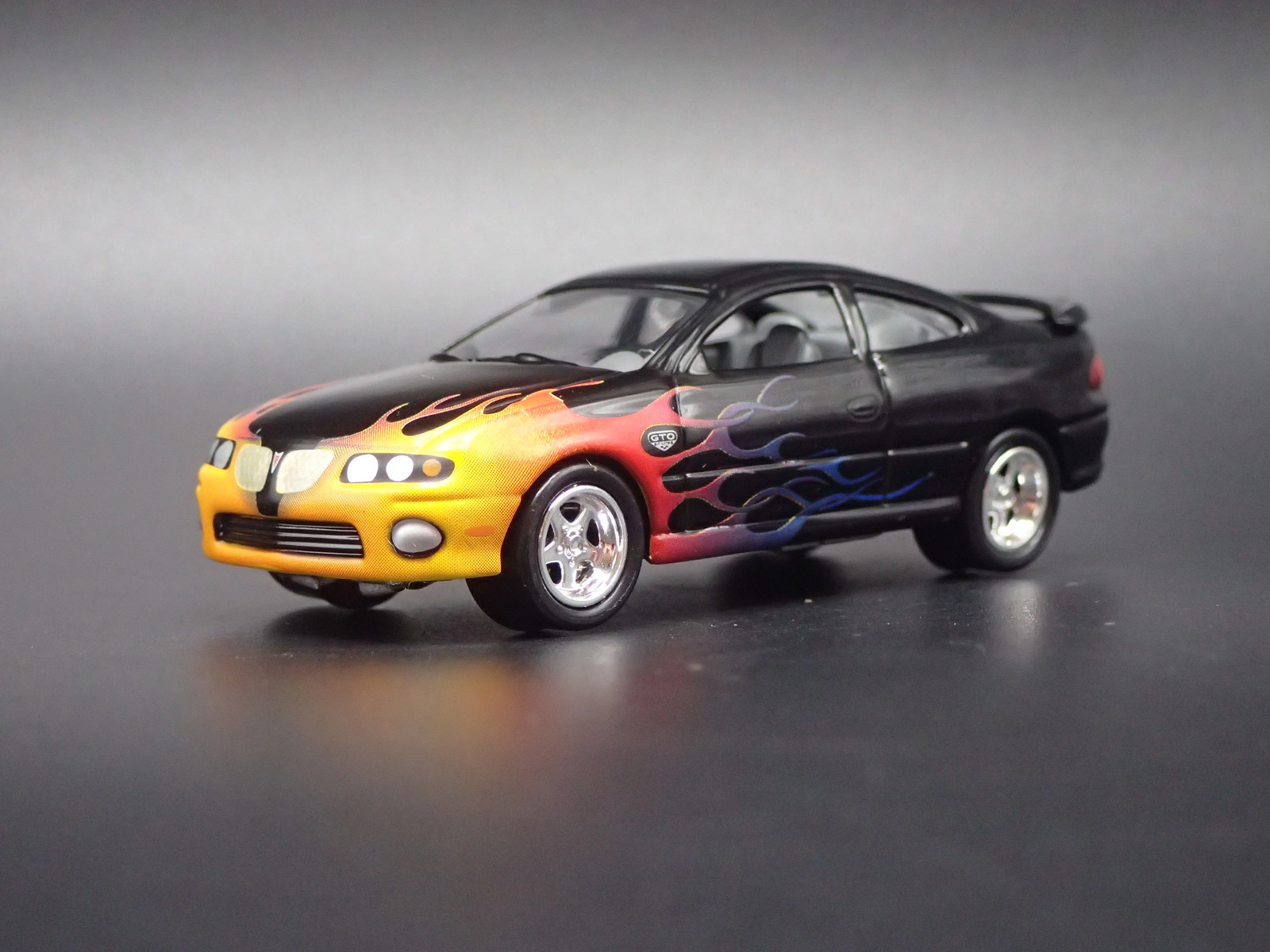 2004-2006 PONTIAC GTO BLACK 1:64 SCALE DIECAST MODEL CAR