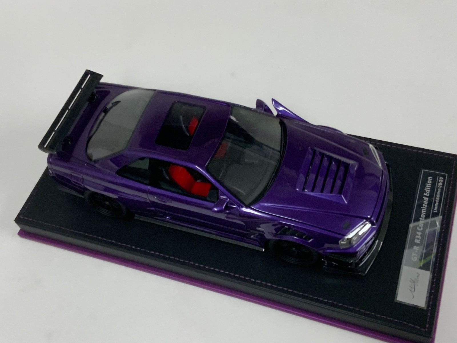 1/18 IVY Nissan R34 customized with Full Engine Purple leather base 20 pieces