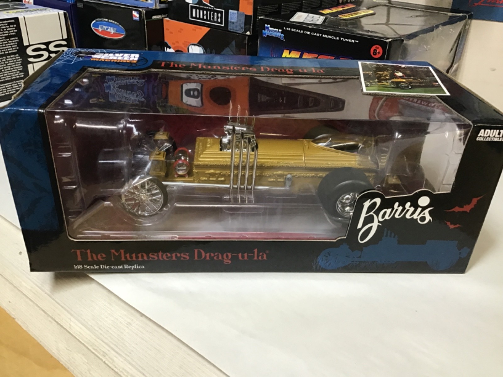 DRAGULA THE MUNSTERS TV SERIES COFFIN CAR AUTO WORLD 1/18 #AWSS137 BARRIS MIB