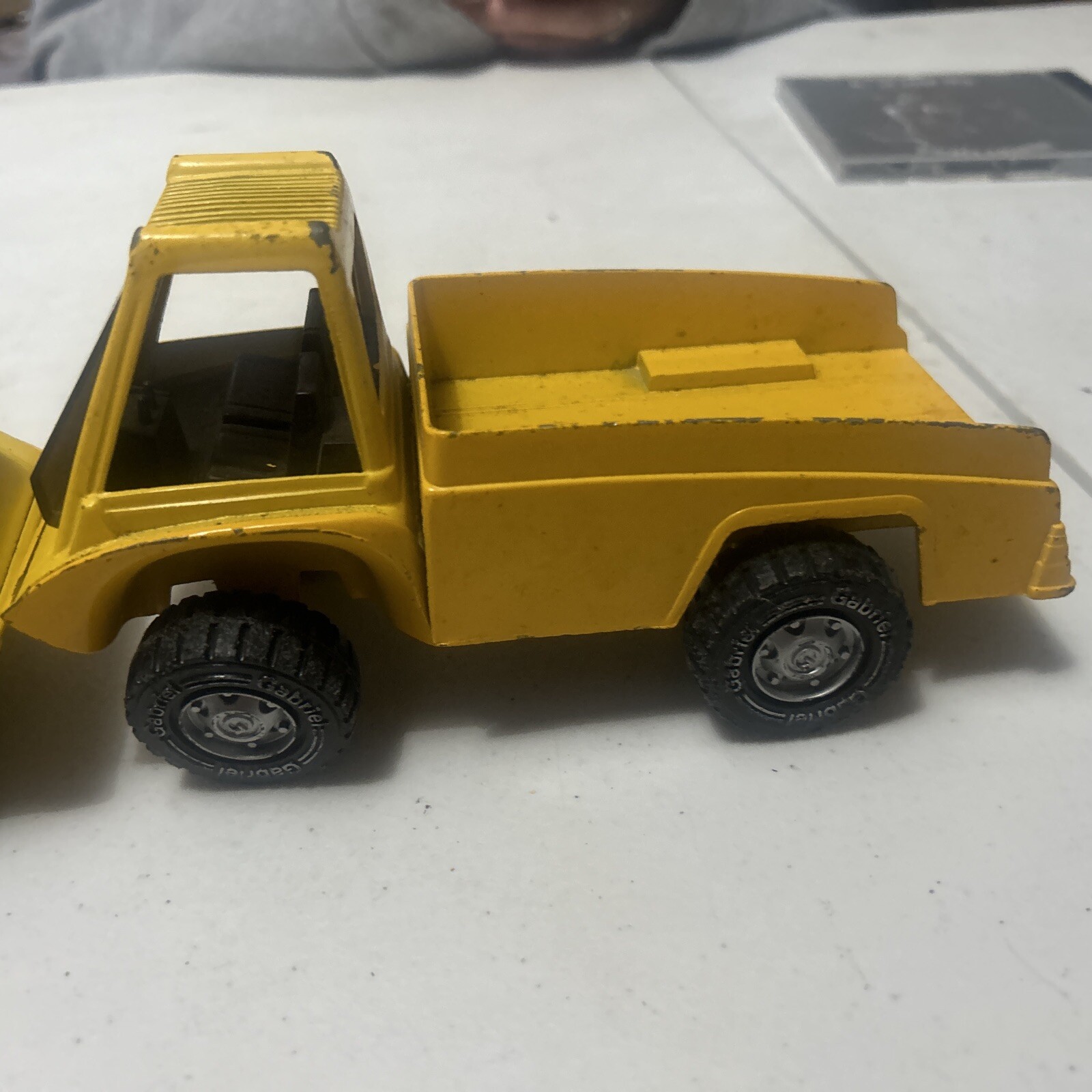 Vintage Gabriel Yellow pressed steel commercial trucks