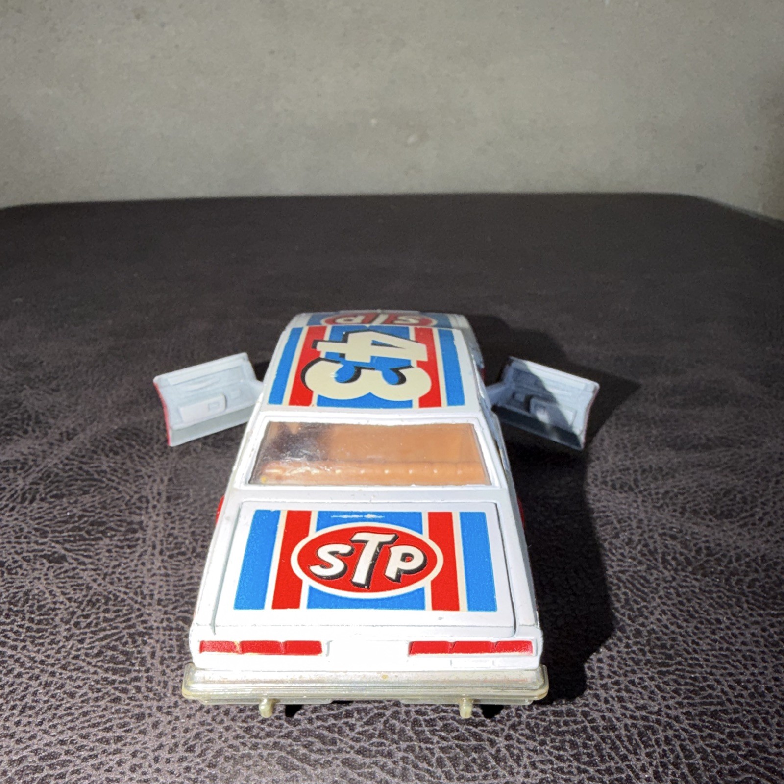 Corgi 1978 Chevrolet Caprice Classic 1:36 Diecast STP Opening Doors