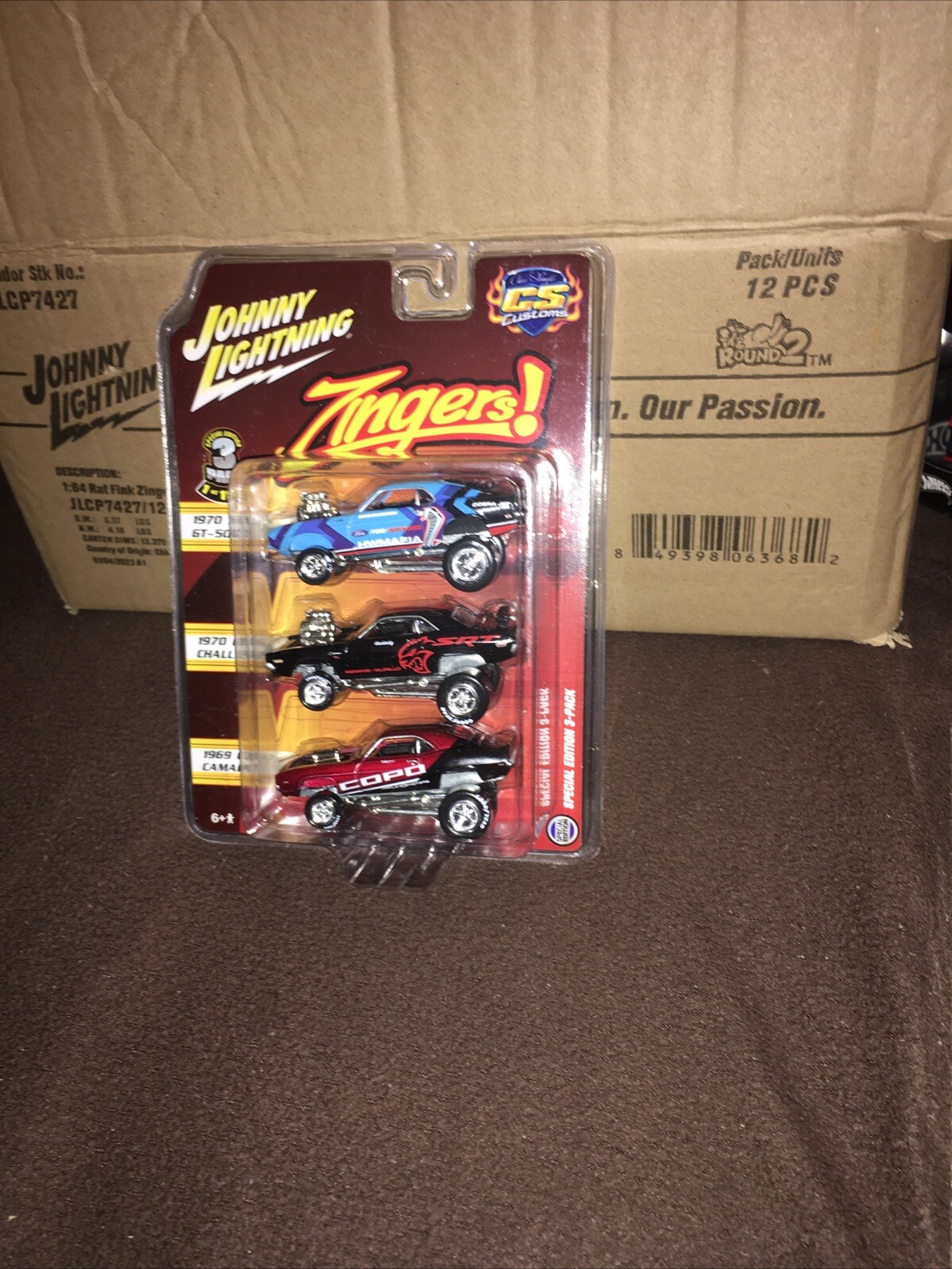 JOHNNY LIGHTNING ZINGERS CS CUSTOMS 3 PACK 70 SHELBY/70 CHALLENGER/69 CAMARO