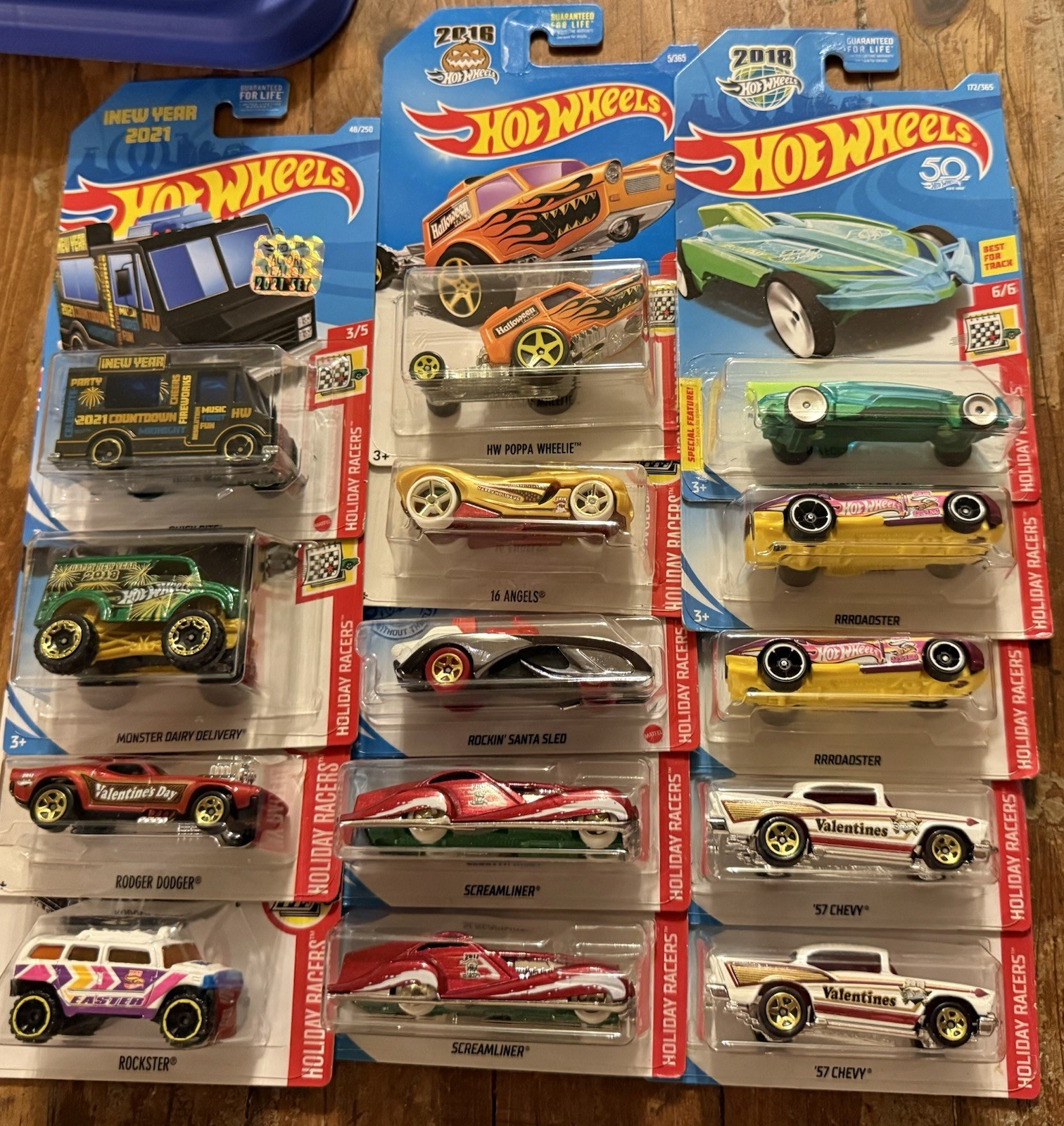 GROUP/LOT OF HOT WHEELS HOLIDAY RACERS! VARIOUS YEARS! 14 TOTAL DIE-CAST CARS!