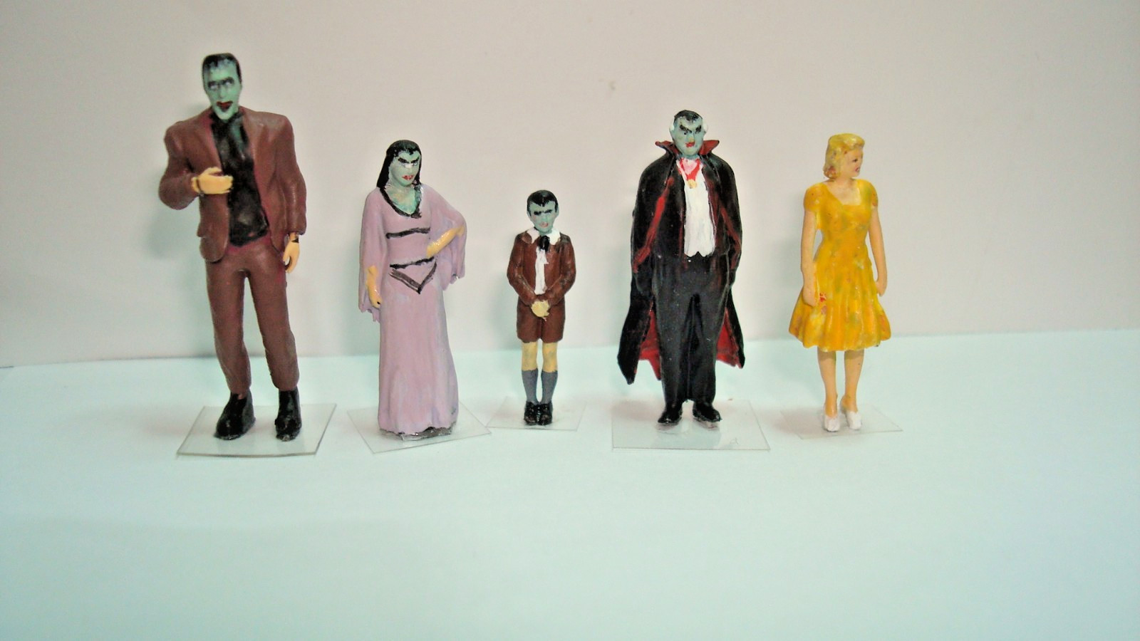 1/64 Scale the Munster’s family only. No car or backdrop is included.