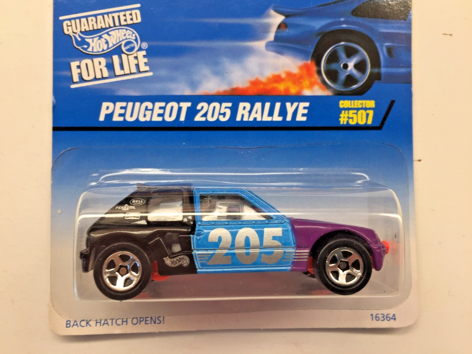 Hot Wheels Peugeot 205 Rallye #507 Black/Blue/Purple with Orange Base 1:64