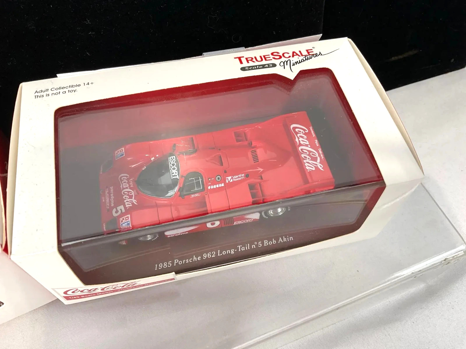 TSM Model TSM09432 Porsche 962 Long Tail 1985 #5 Bob Akin Coca Cola 1:43 Diecast