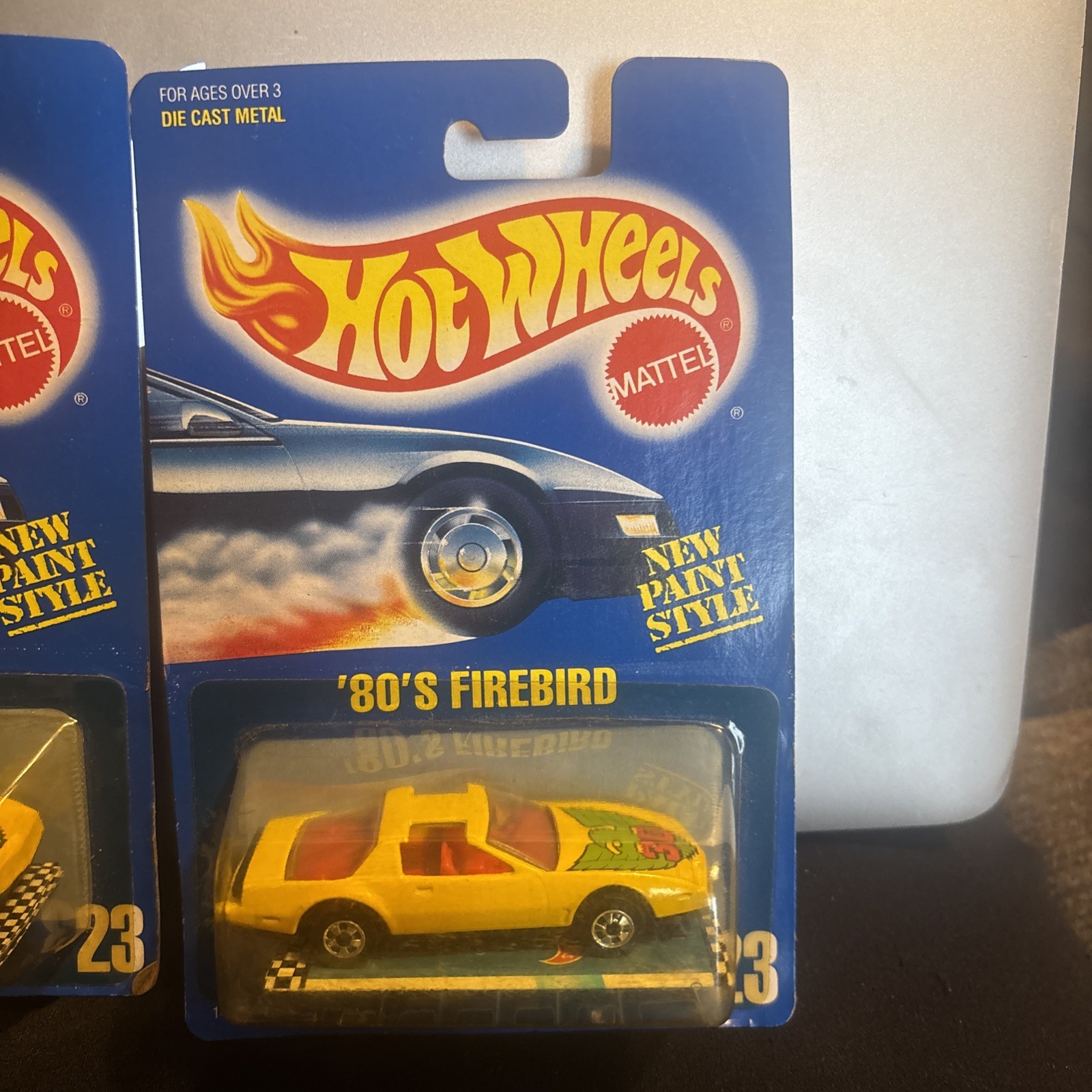 2- 1990 Hotwheels Blue Card Yellow ’80’s Firebird Card 23 New Paint Style