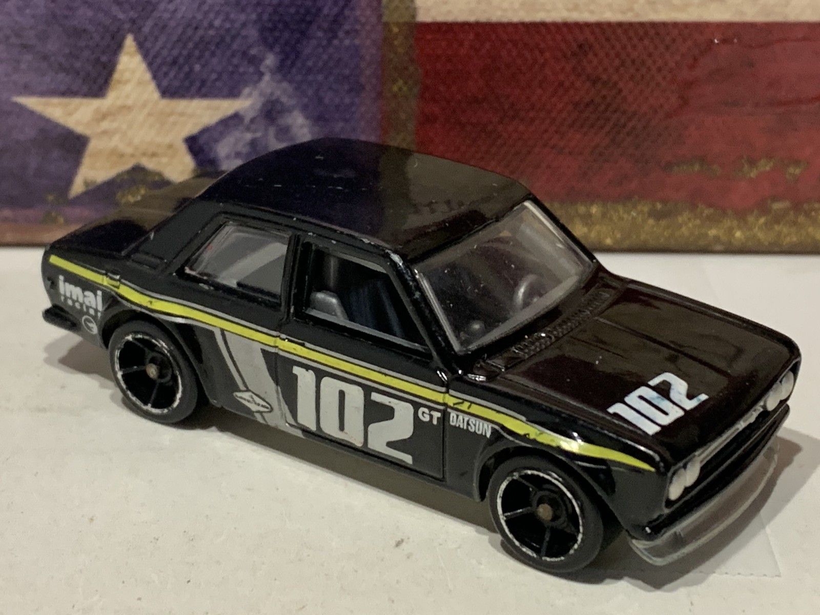 HOT WHEELS DATSUN BLUEBIRD 510. 2009 NEW MODELS. BLACK/YELLOW #102. LOOSE