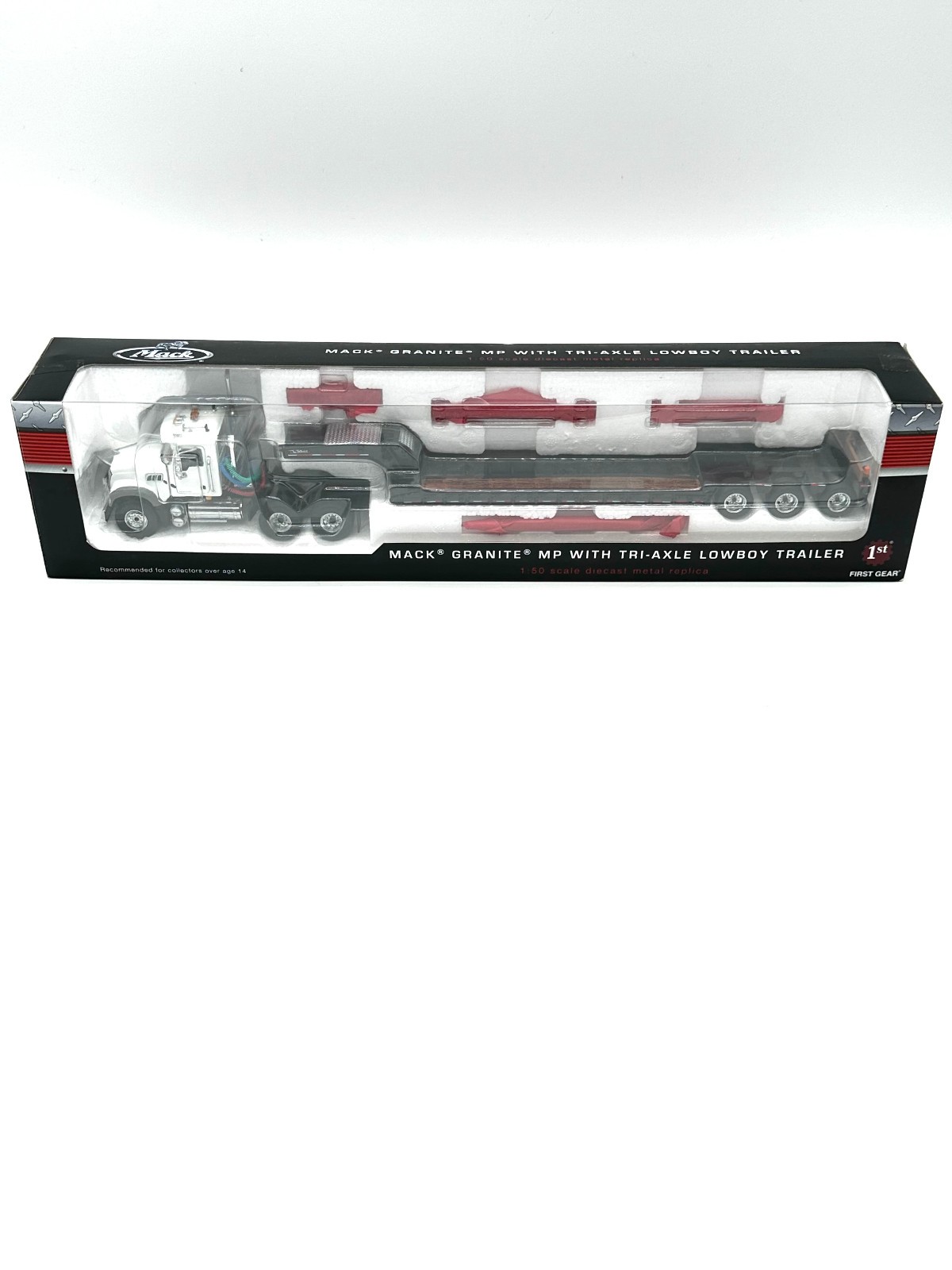 White & Black Mack Granite MP Truck w/Tri Axle Lowboy By First Gear 1/50th Scale