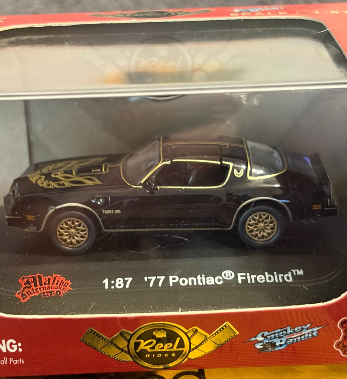 Real Rides 1977 Firebird 1:87 Diecast “Smokey and the Bandit” Malibu Intern.