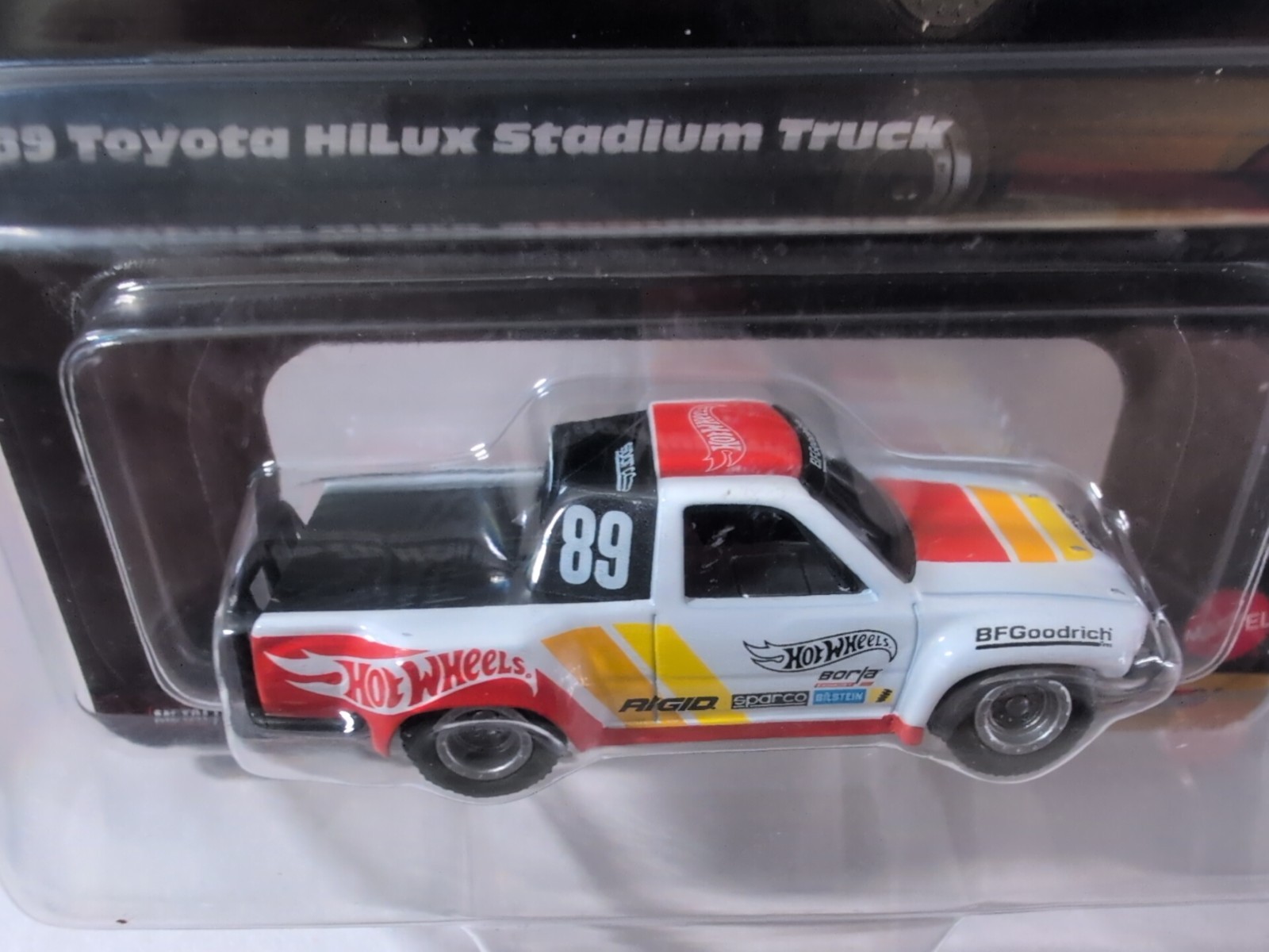 2024 Hot Wheels Elite 64 1989 Toyota Hilux Stadium Truck With Protector NEW!