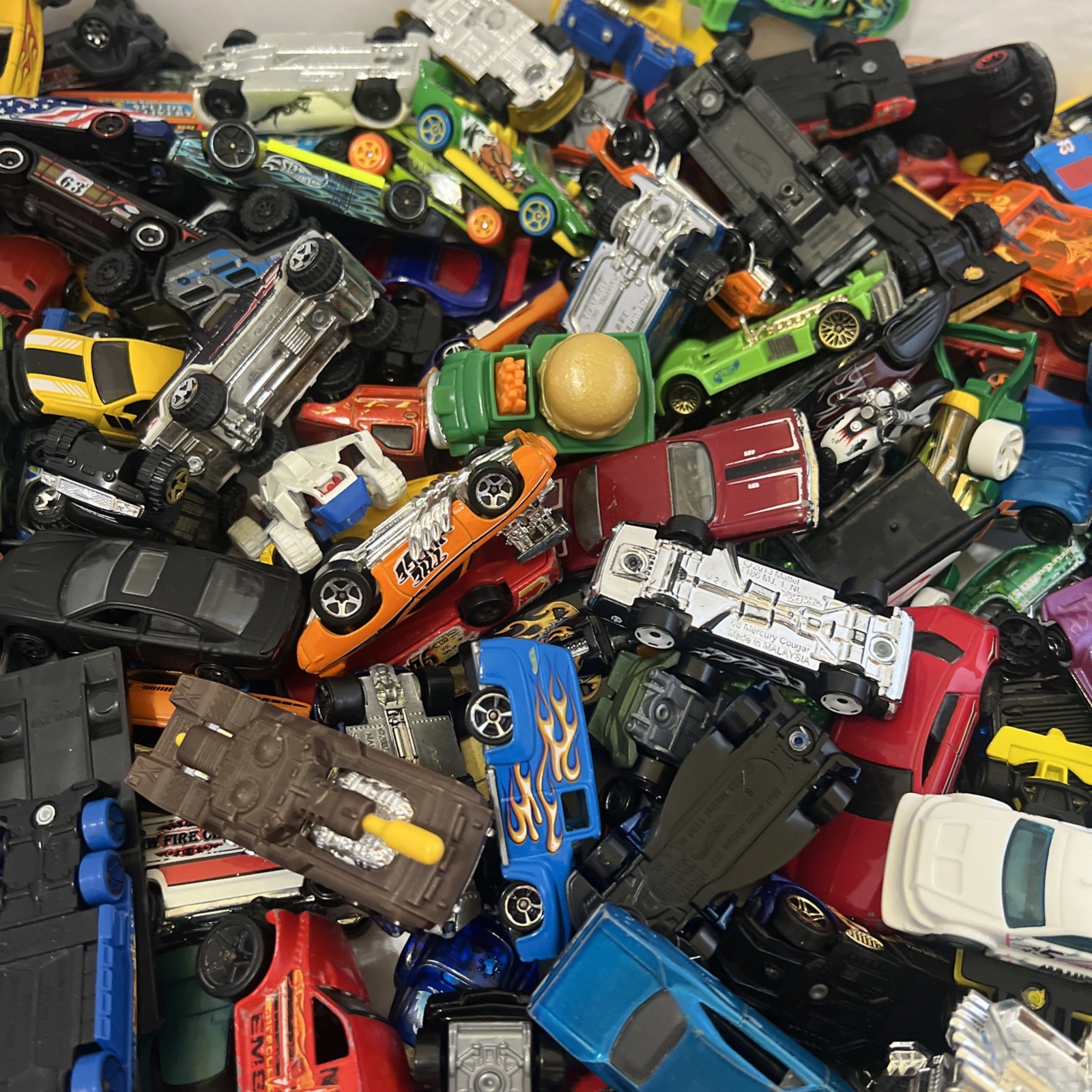 30 LBS Pounds of pure hotwheels. There are many different years and castings.