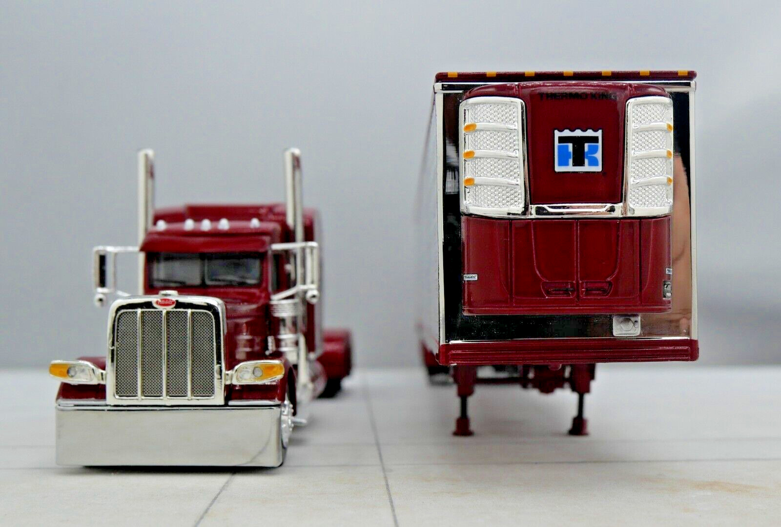 DCP 1/64 Maroon Red Chrome Peterbilt 389 Utility Refrigerated Trailer 60-1734