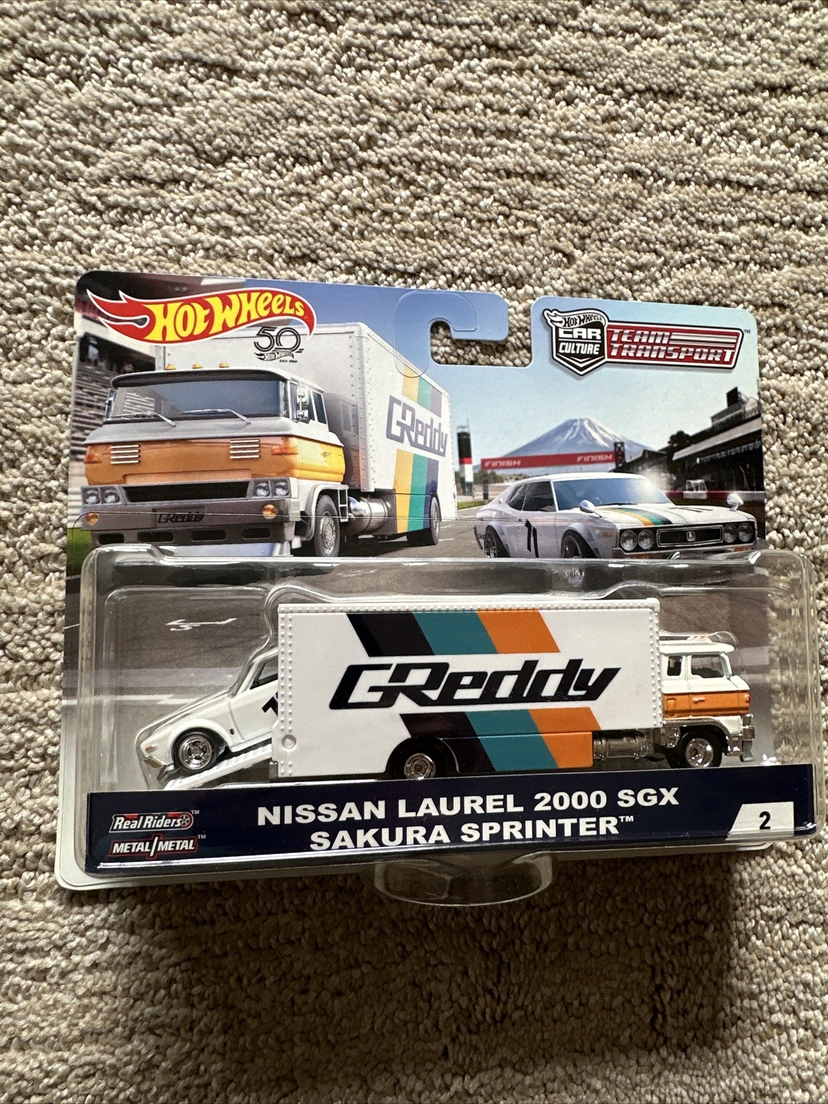 Hot Wheels Team Transport NISSAN LAUREL 2000 SGX Sakura Sprinter # 2 NEW