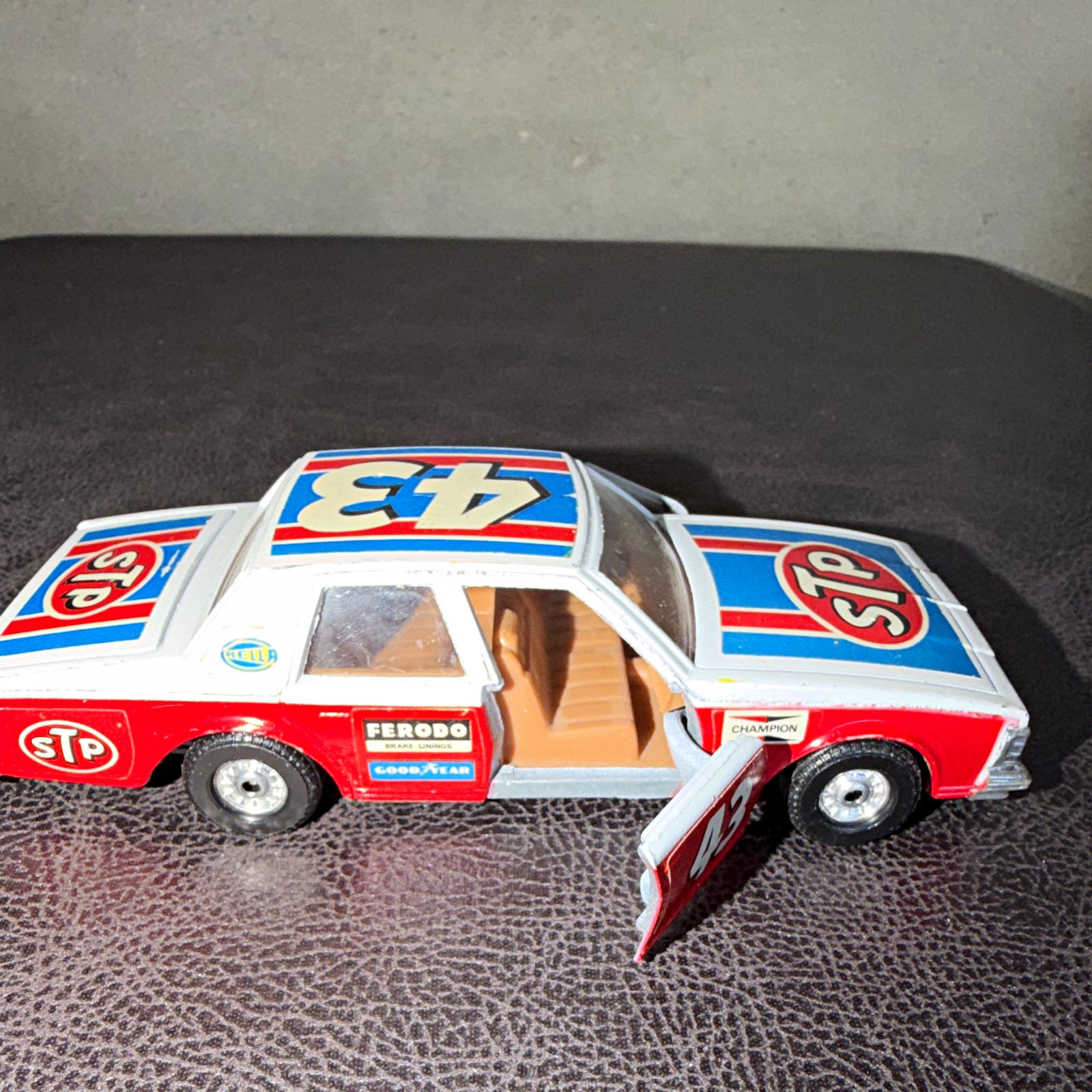 Corgi 1978 Chevrolet Caprice Classic 1:36 Diecast STP Opening Doors