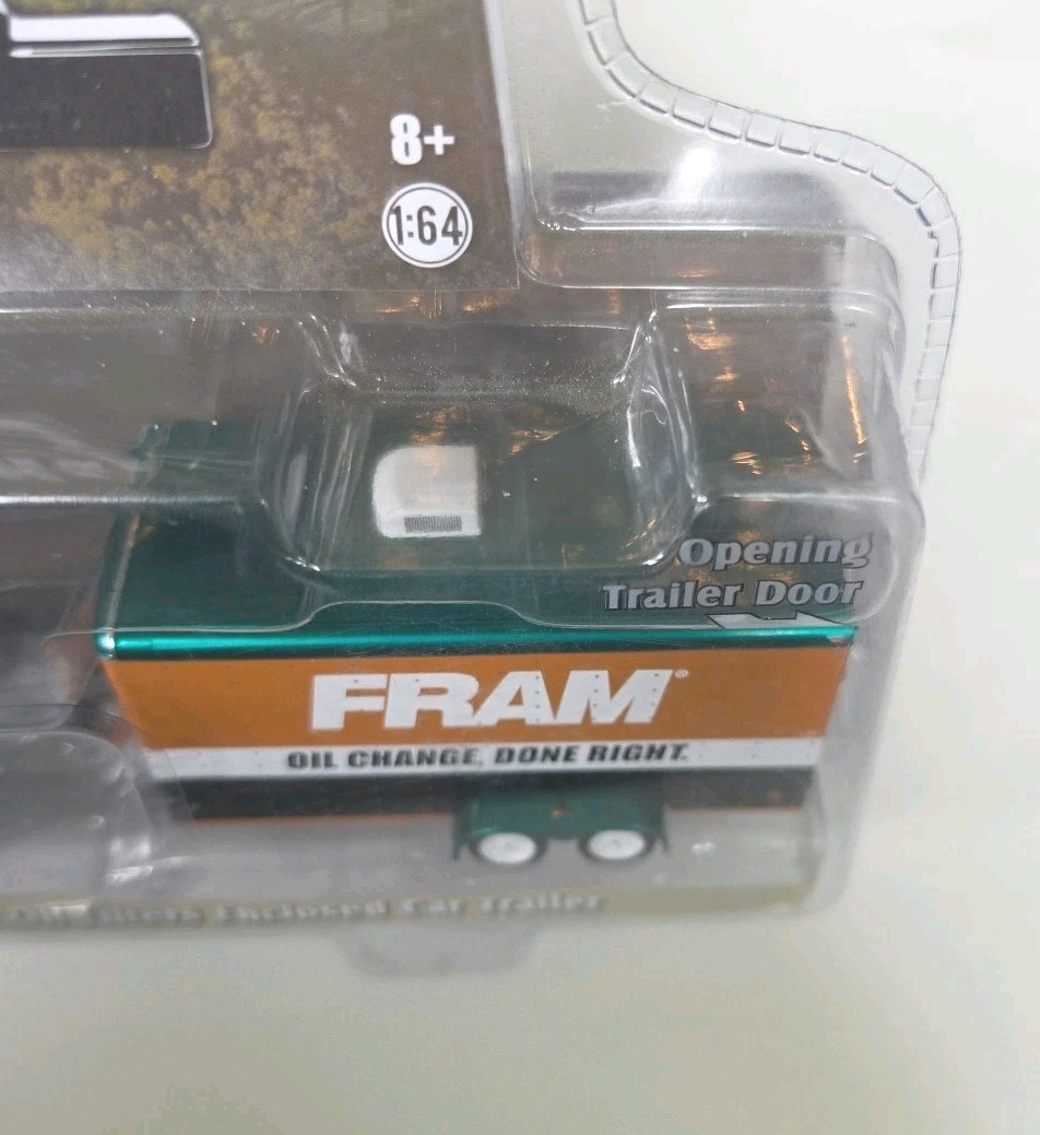 Greenlight Chase 1994 Ford F-150 XLT & Fram Oil Filters Enclosed Car Trailer