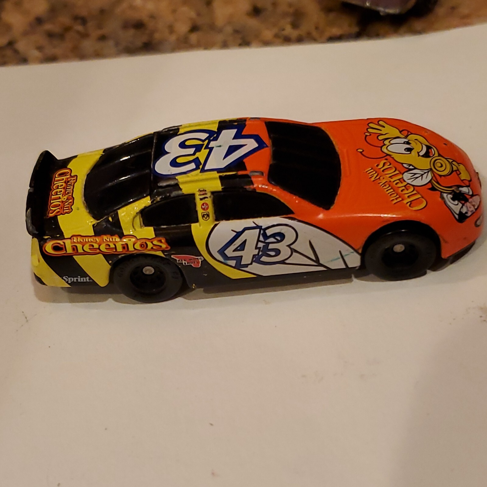 Hot Wheels Honey Nut Cheerios #43 Race Car. Please see photos of actual item for