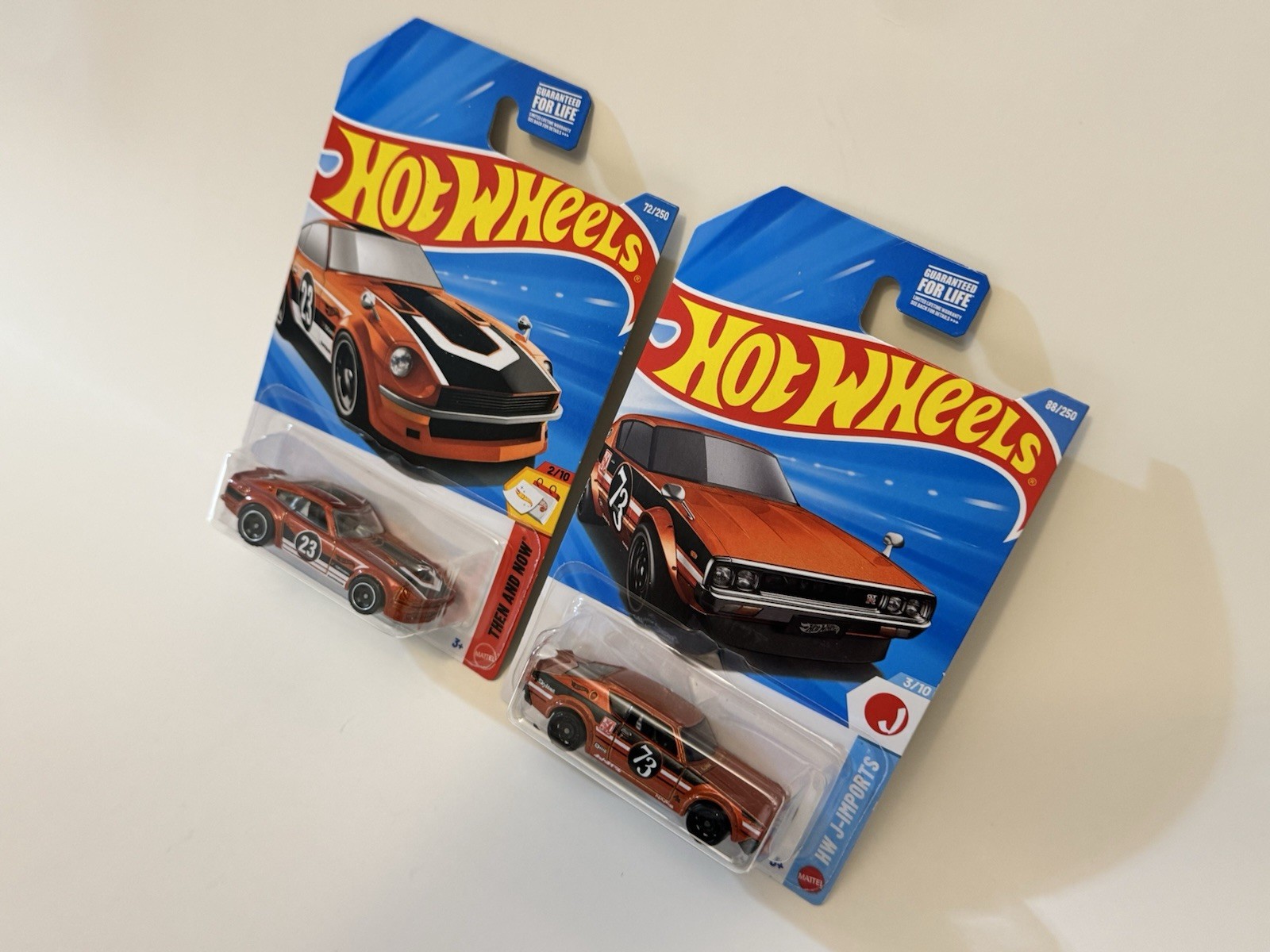 Hot Wheels JDM Nissan Skyline 2000GT-R + Fairlady Z Orange Then & Now – LOT OF 2