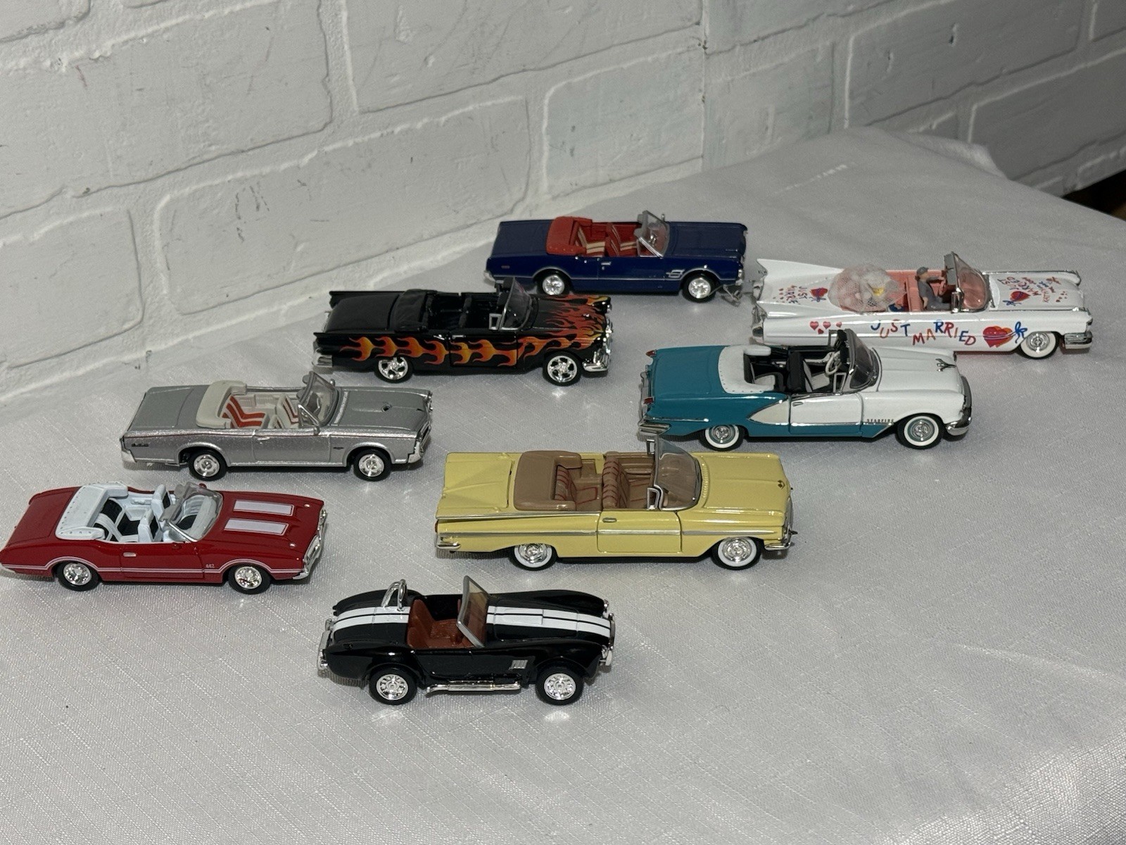 Lot of 8 Mixed 1/43 Convertible’s GTO Olds Cobra Impala Ford Cadillac Married