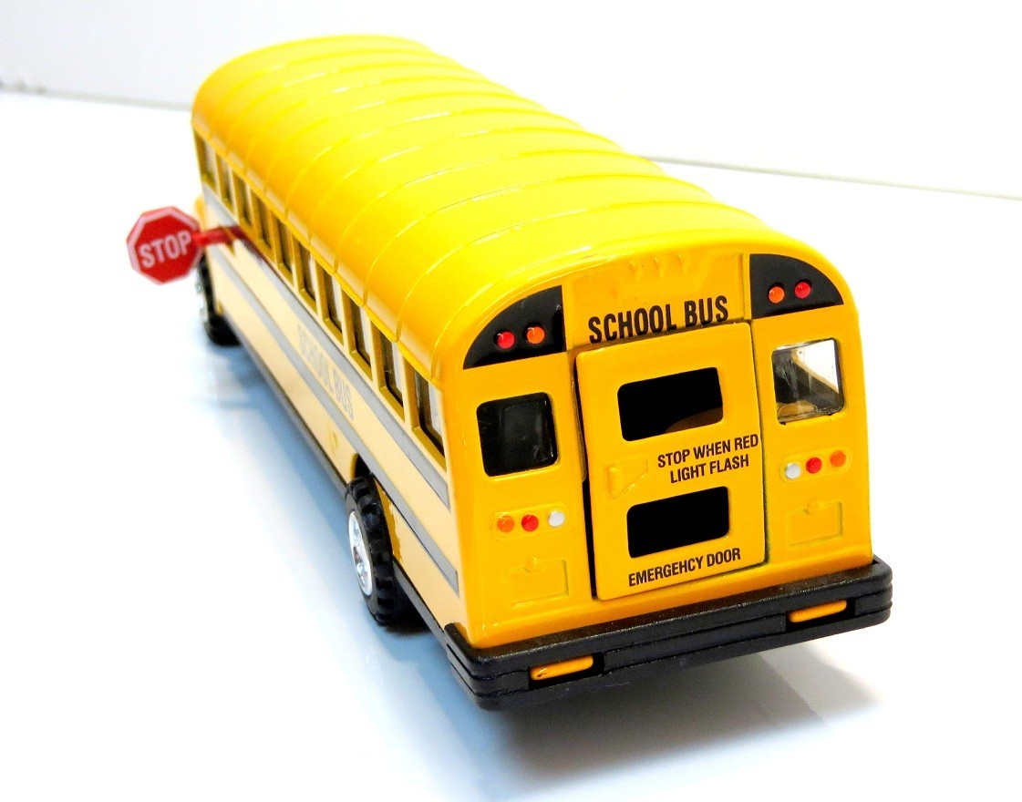 Large Diecast School Bus with Pullback Action, Stop Sign, and opening Doors