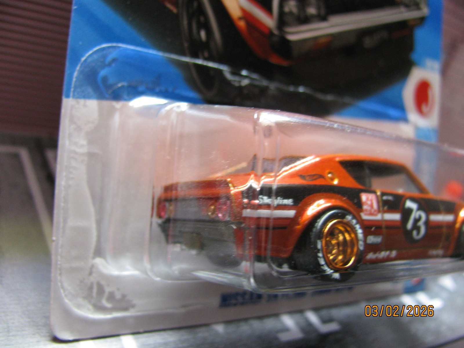 2026 Hot Wheels Burnt Orange Nissan Skyline 2000 GT-R, w/Real Riders Wheel Swap