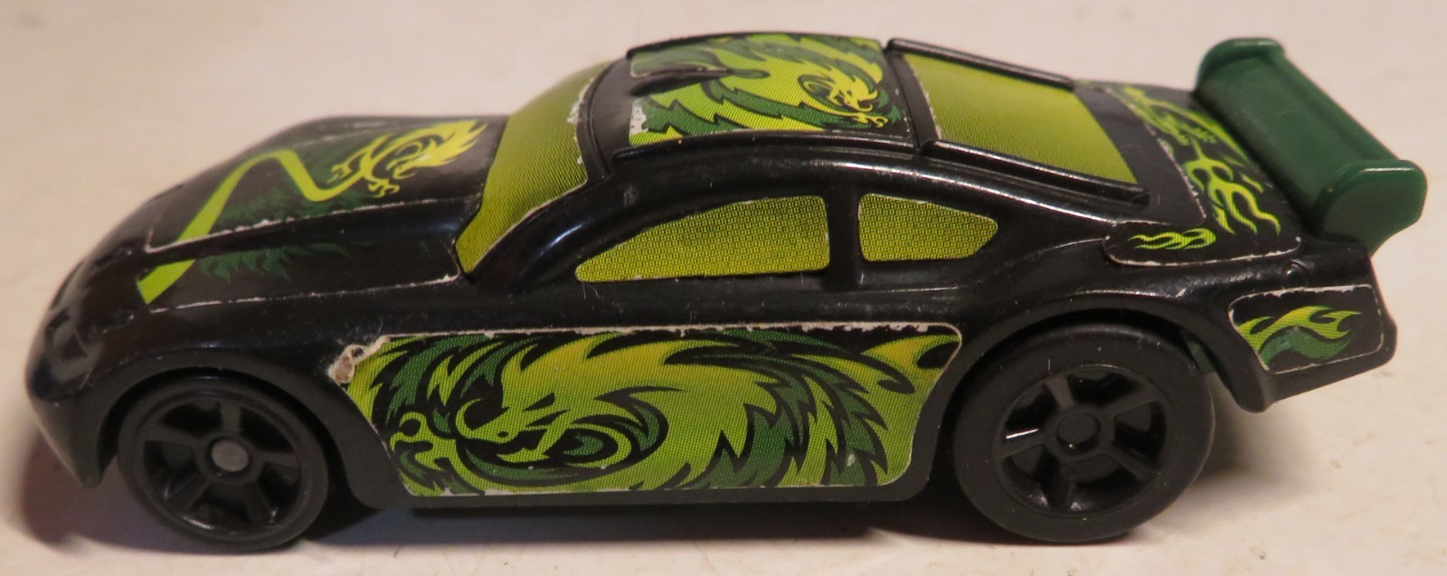 Hot Wheels Mattel General Mills Black Green Pullback Action Plastic Car 2011 GUC