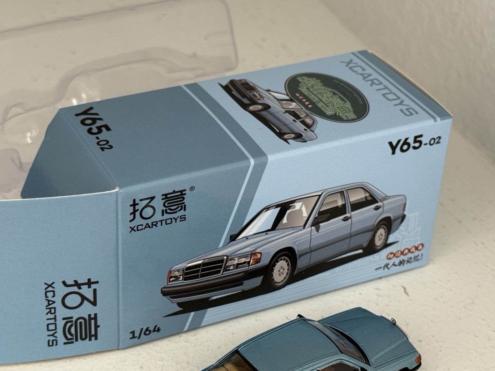 Xcartoys 1:64 diecast Y65-02 Mercedes Benz 190E in light blue 2-tone; Boxed