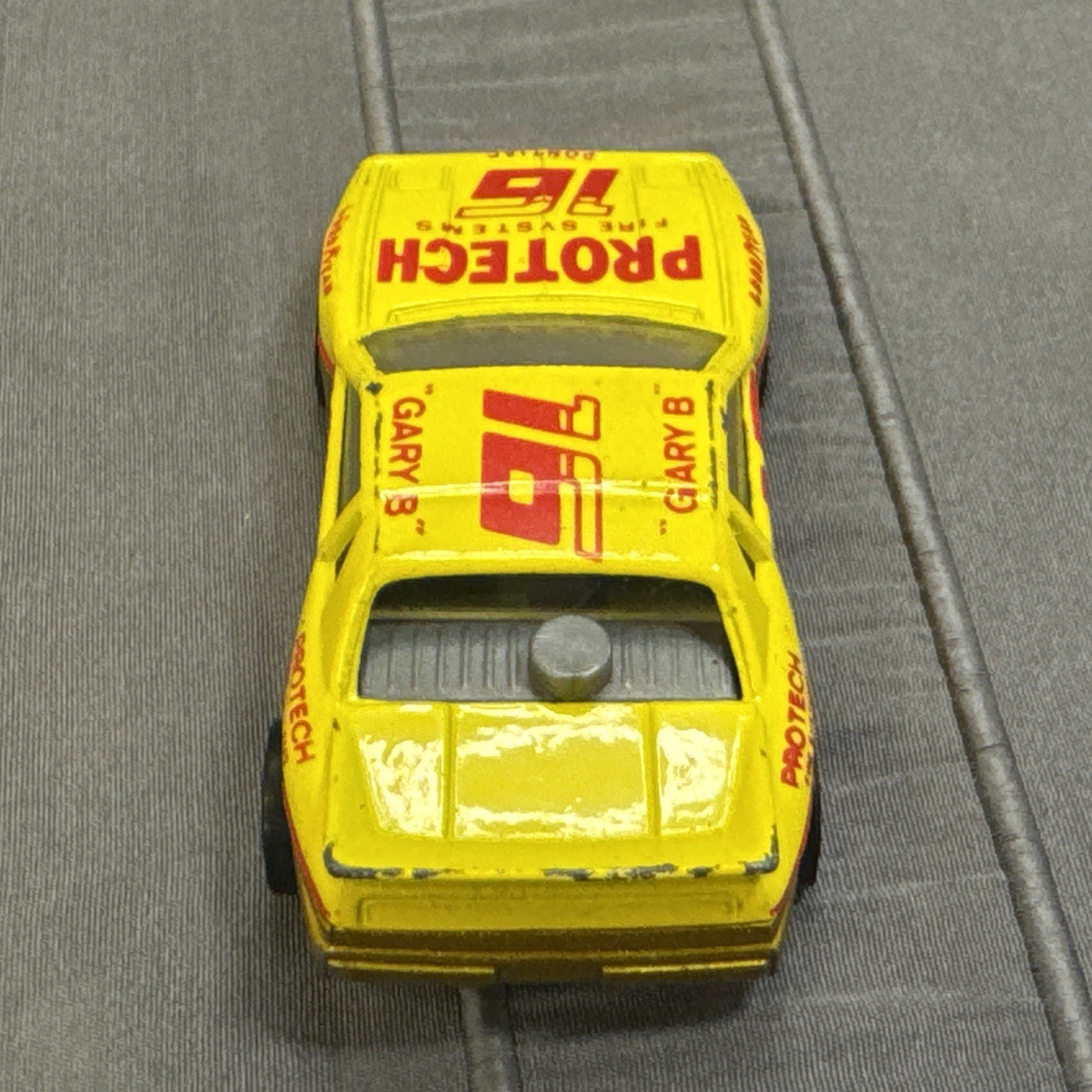 Matchbox Pontiac Fiero, Yellow, #16 Protech Fire Systems