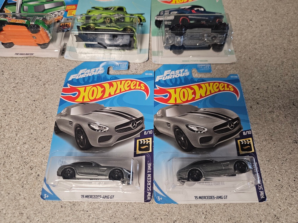Lot OF 14 HOT WHEELS ALL NEW. VARIETY AND DIFFERENT YEARS. SEE PICS