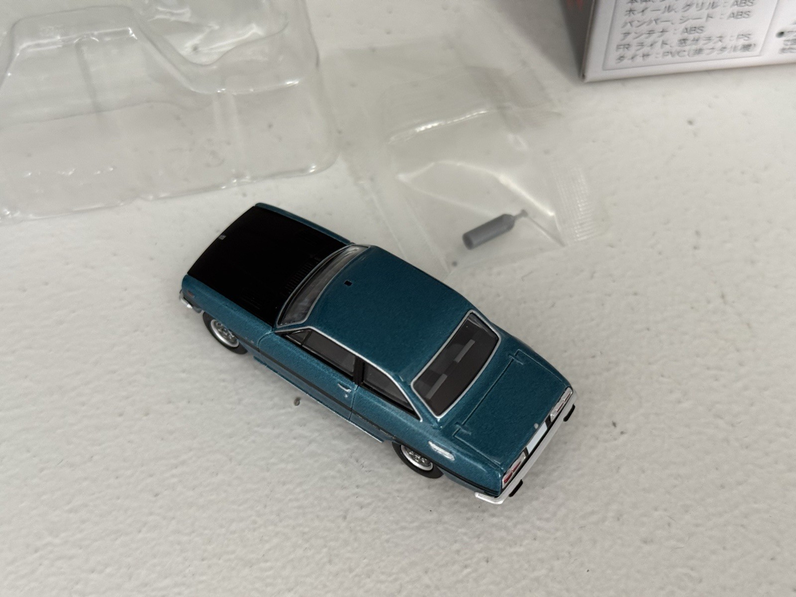 Tomica Limited Vintage 1:64 diecast LV-150d Isuzu Bellett 1600GTR in blue