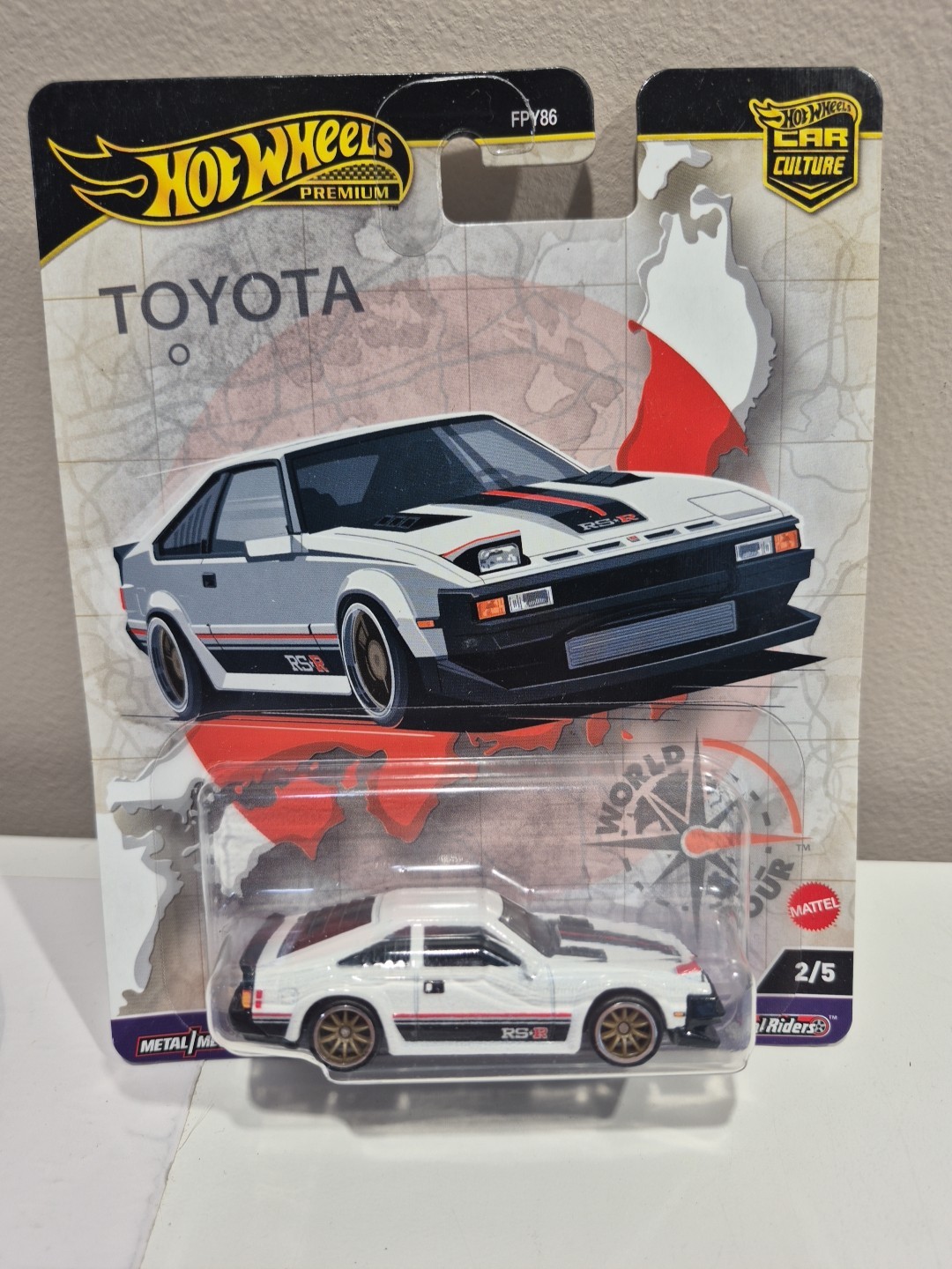 Hot Wheels 82 Toyota Supra World Tour 1/64 Premium Real Riders M17