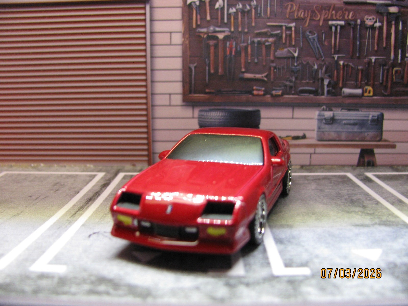 2025 Maisto Red 1985 Chevy Camaro IROC-Z, w/Real Riders Wheel Swap