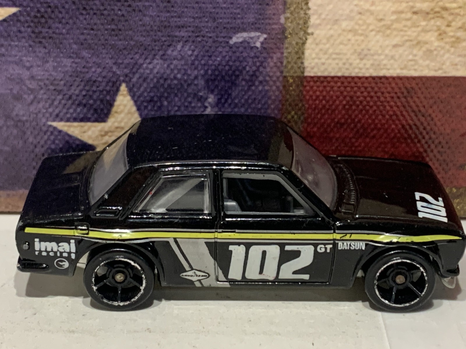 HOT WHEELS DATSUN BLUEBIRD 510. 2009 NEW MODELS. BLACK/YELLOW #102. LOOSE