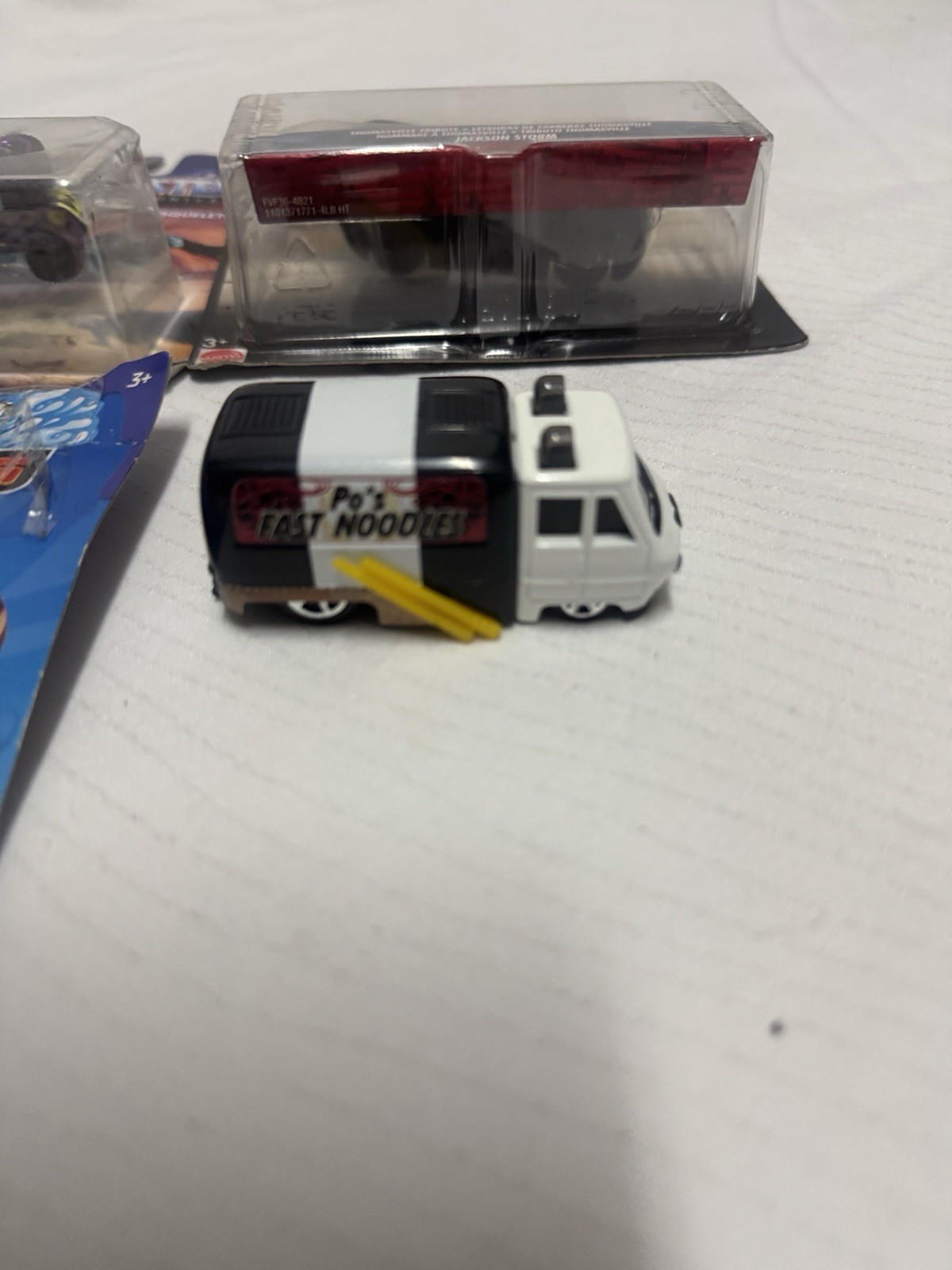 hot wheels mix lot of 4- see photos please-damaged package-new never used